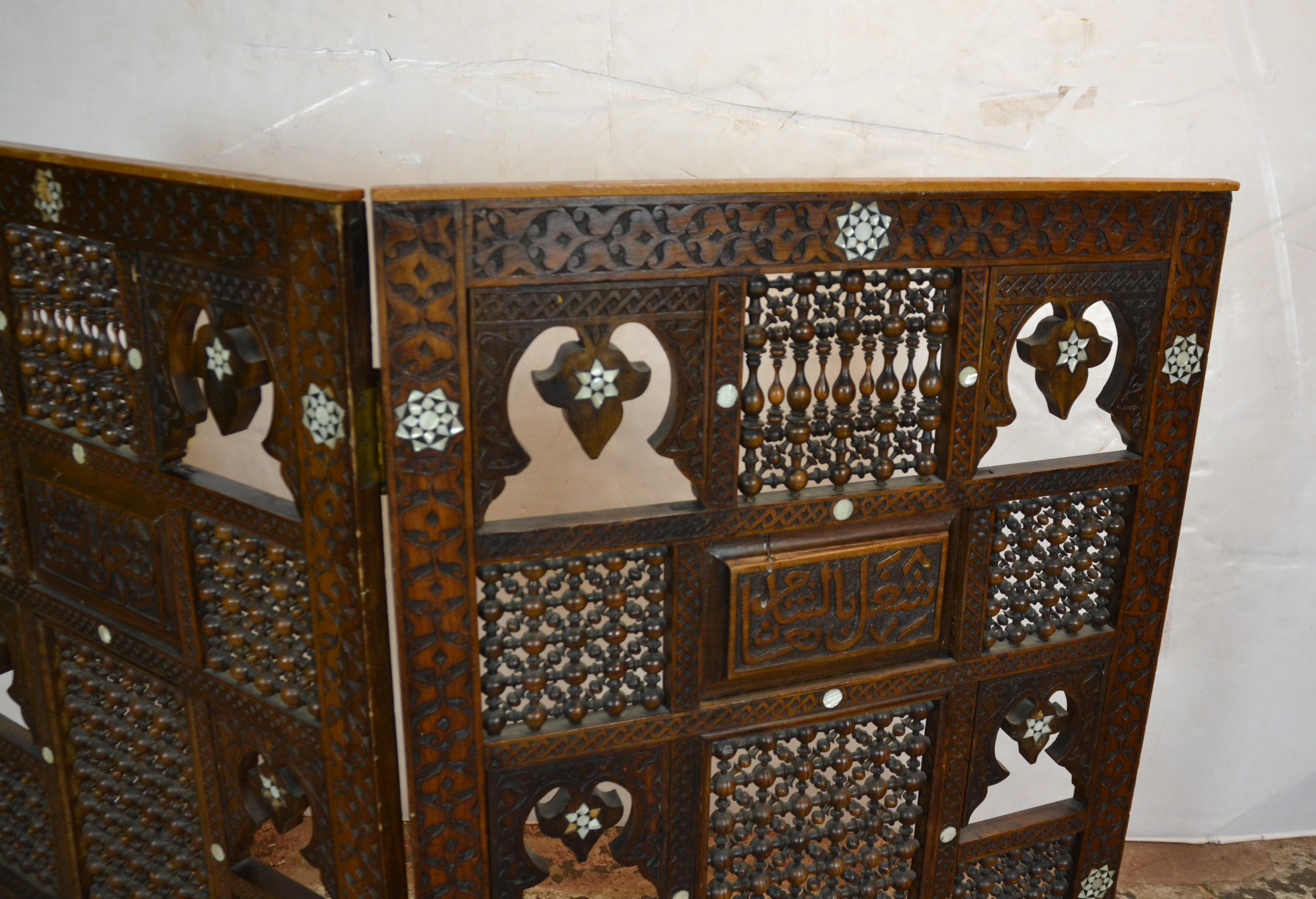 Syrian two-panel tabletop screen with mother of pearl inlay.