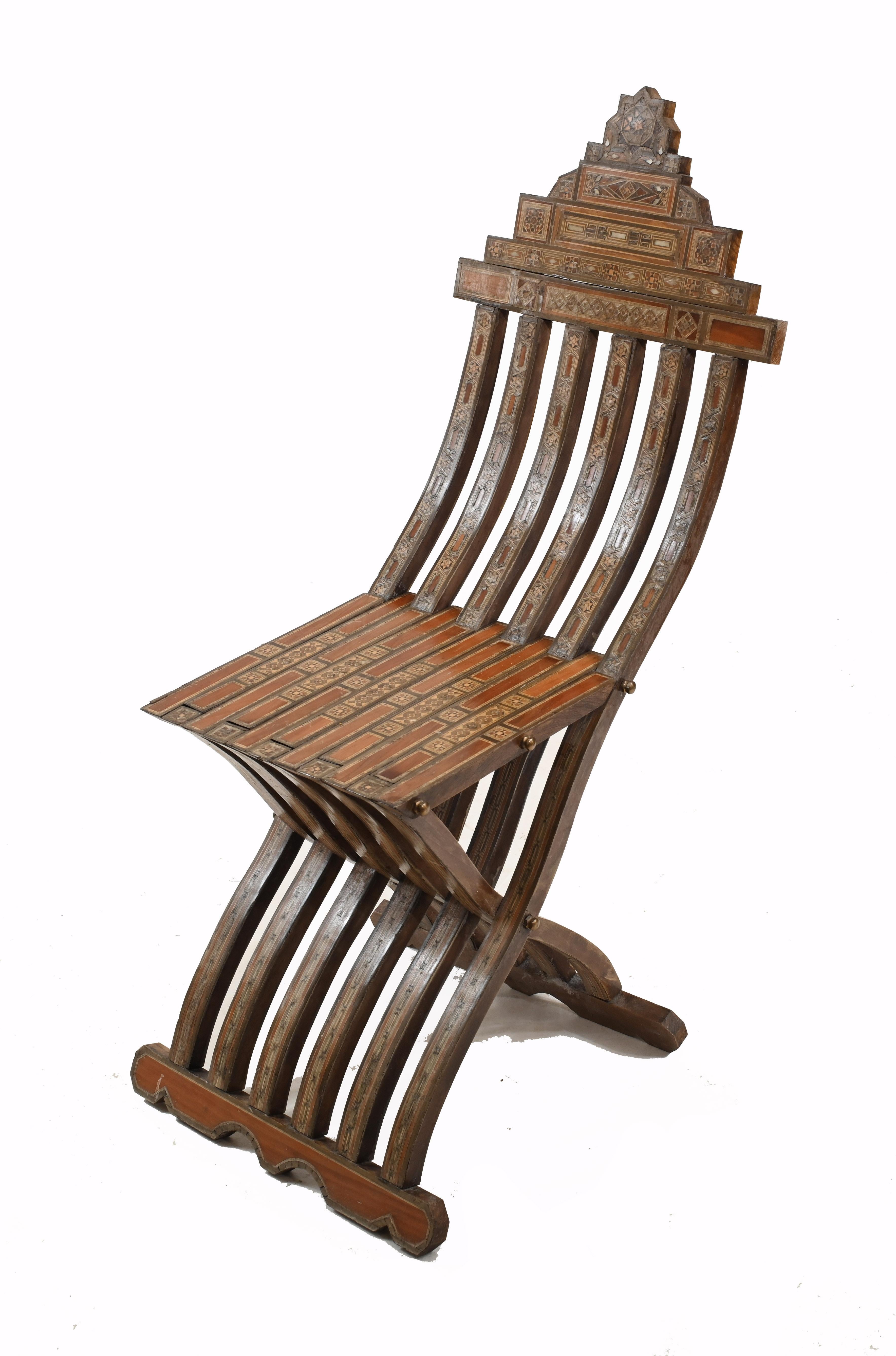 Gorgeous antique Syria folding chair
We date this to circa 1860 and it features a plethora of inlay and Arabesques
Great bohemian chic interiors look
Some of our items are in storage so please check ahead of a viewing to see if it is on our shop