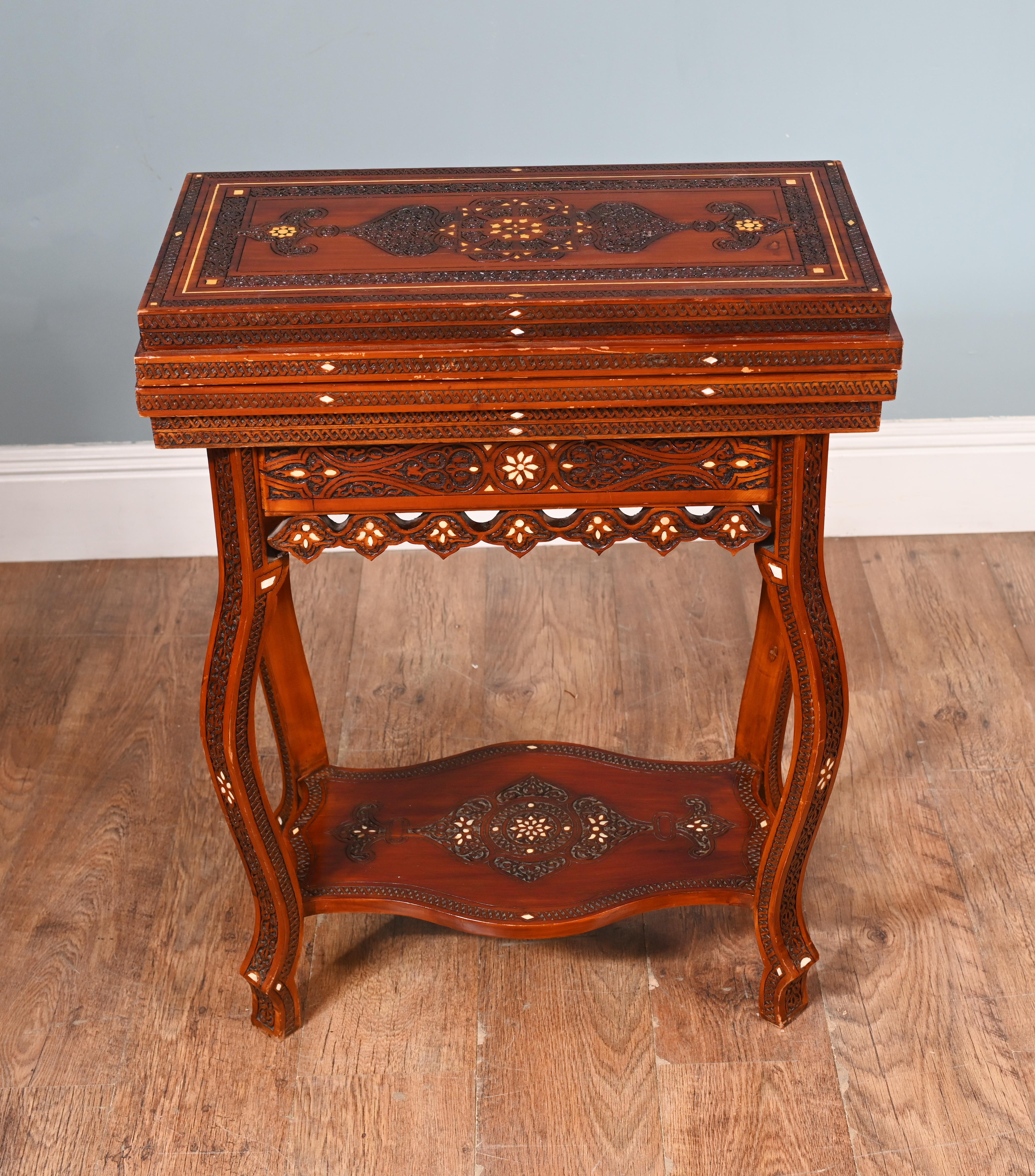 You are viewing a gorgeous Syrian inlay games table
Classic piece of Damascan furniture with trademark Arabic motifs very on trend
Can be used as a console or display table but also opens up to reveal chess band backgammon board
The table is