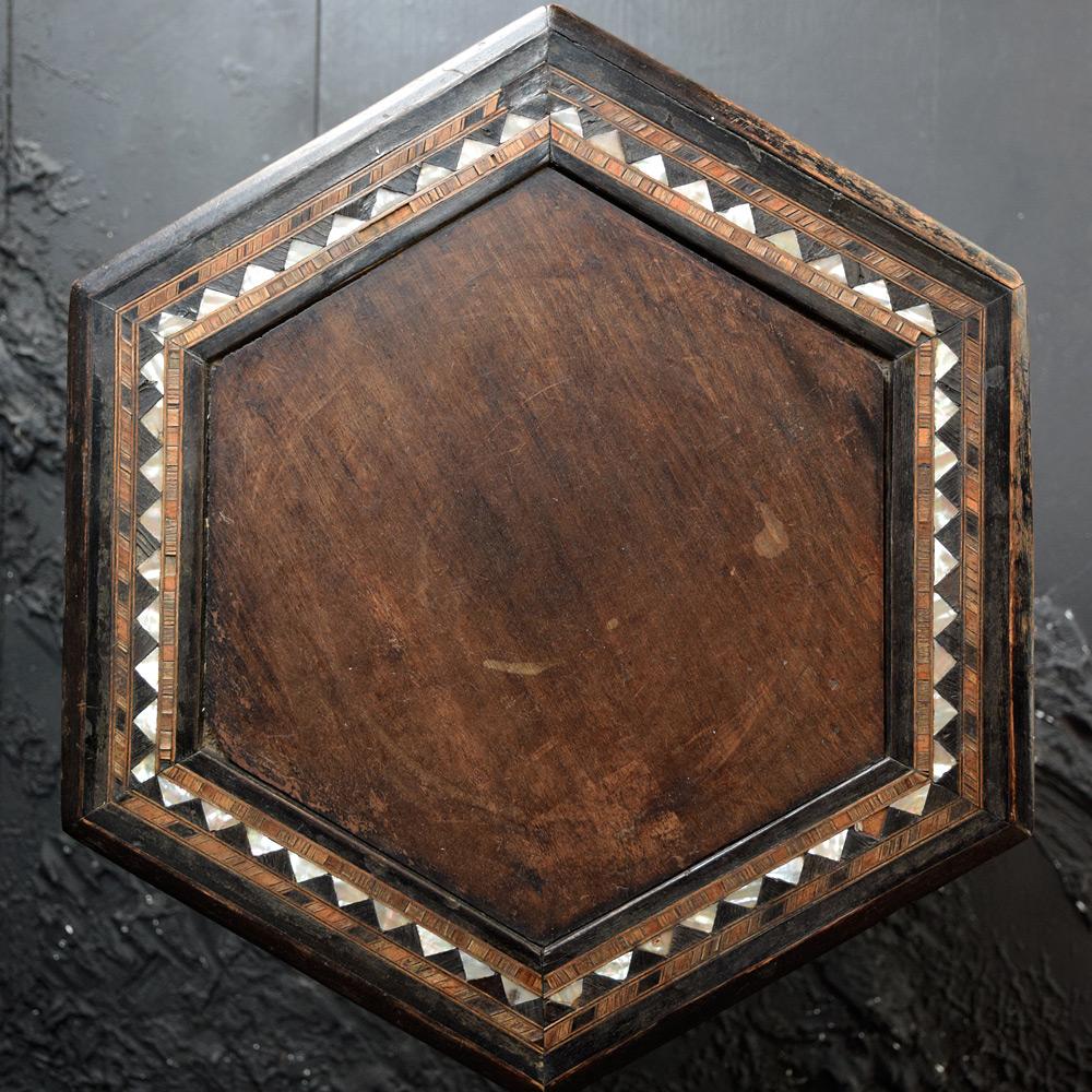 Syrian marquetry mother of pearl table 

A highly decorative Syrian octagonal table, in blackened wood marquetry, clear wood and mother-of-pearl.

Size in inches: H 20” x W 16.5” x D 16.5”

Completely solid in structure and form, showing