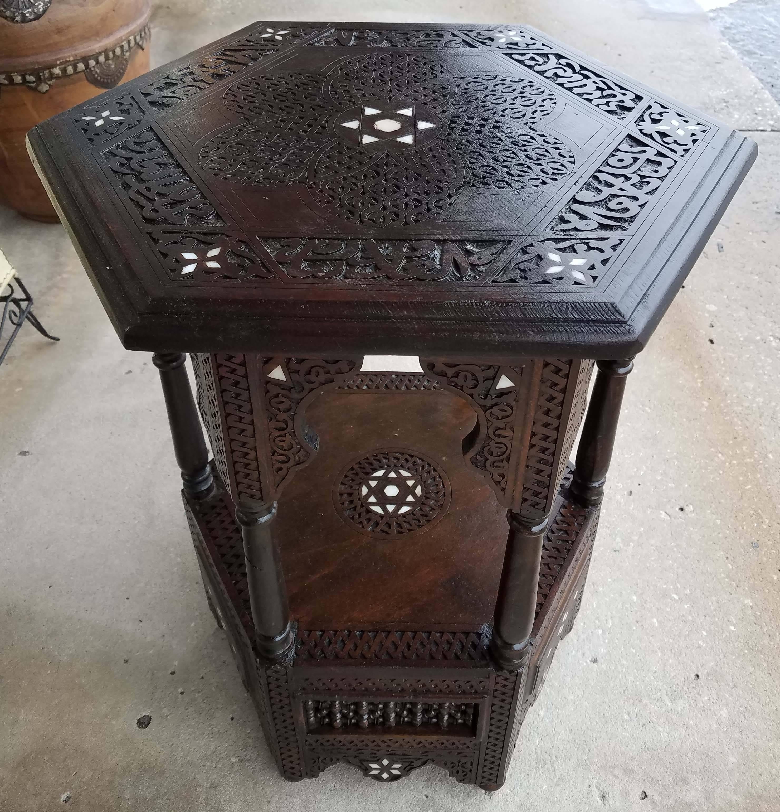Gorgeous Syrian style mother-of-pearl side table made in Morocco. Made of walnut wood. Very intricate carvings throughout. Approximately 24