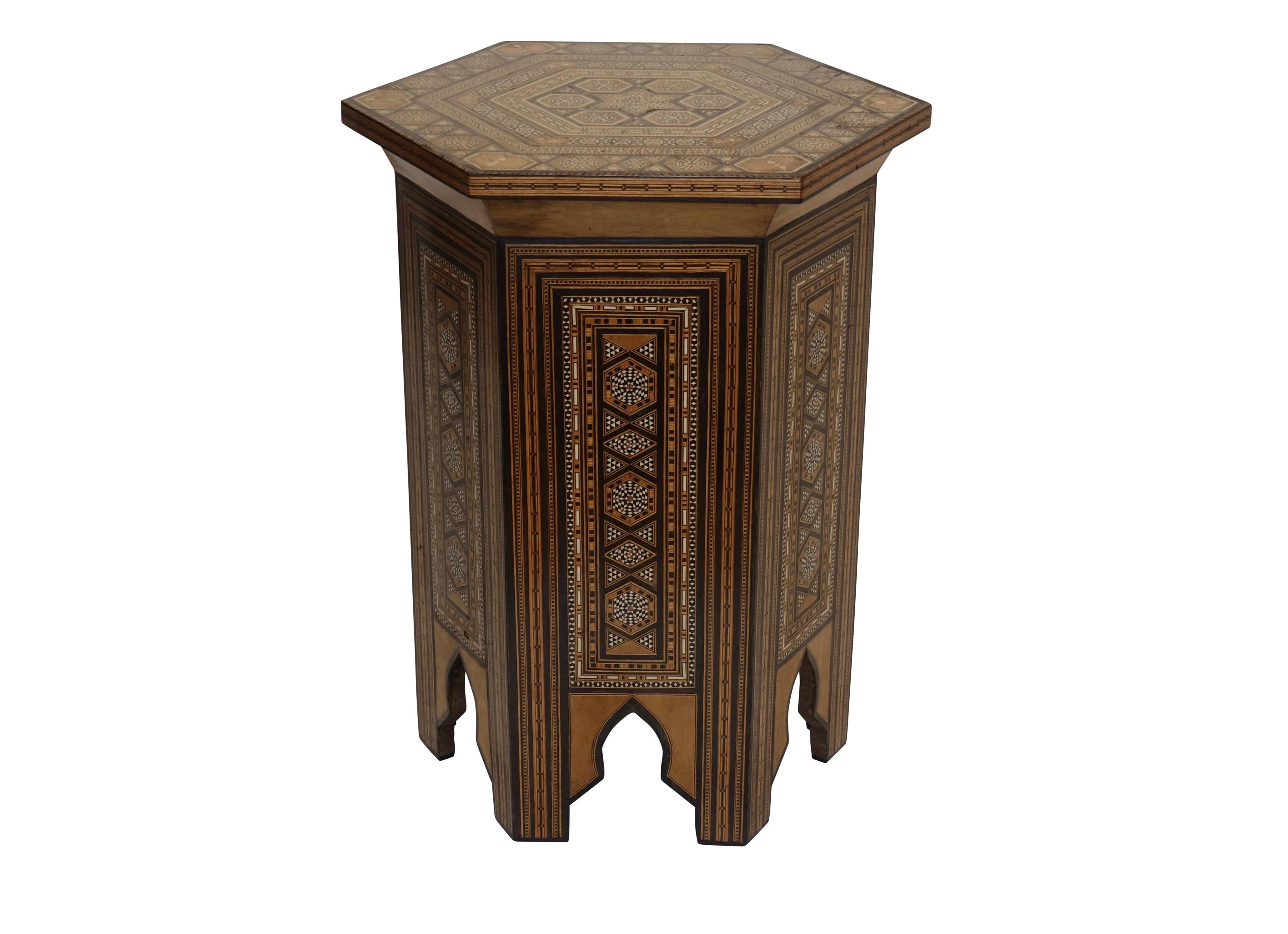 Hexagonal shape tabouret side table with multi wood inlay, along with bone and mother of pearl, all in geometric design. Syrian or Middle eastern, early 20th century.