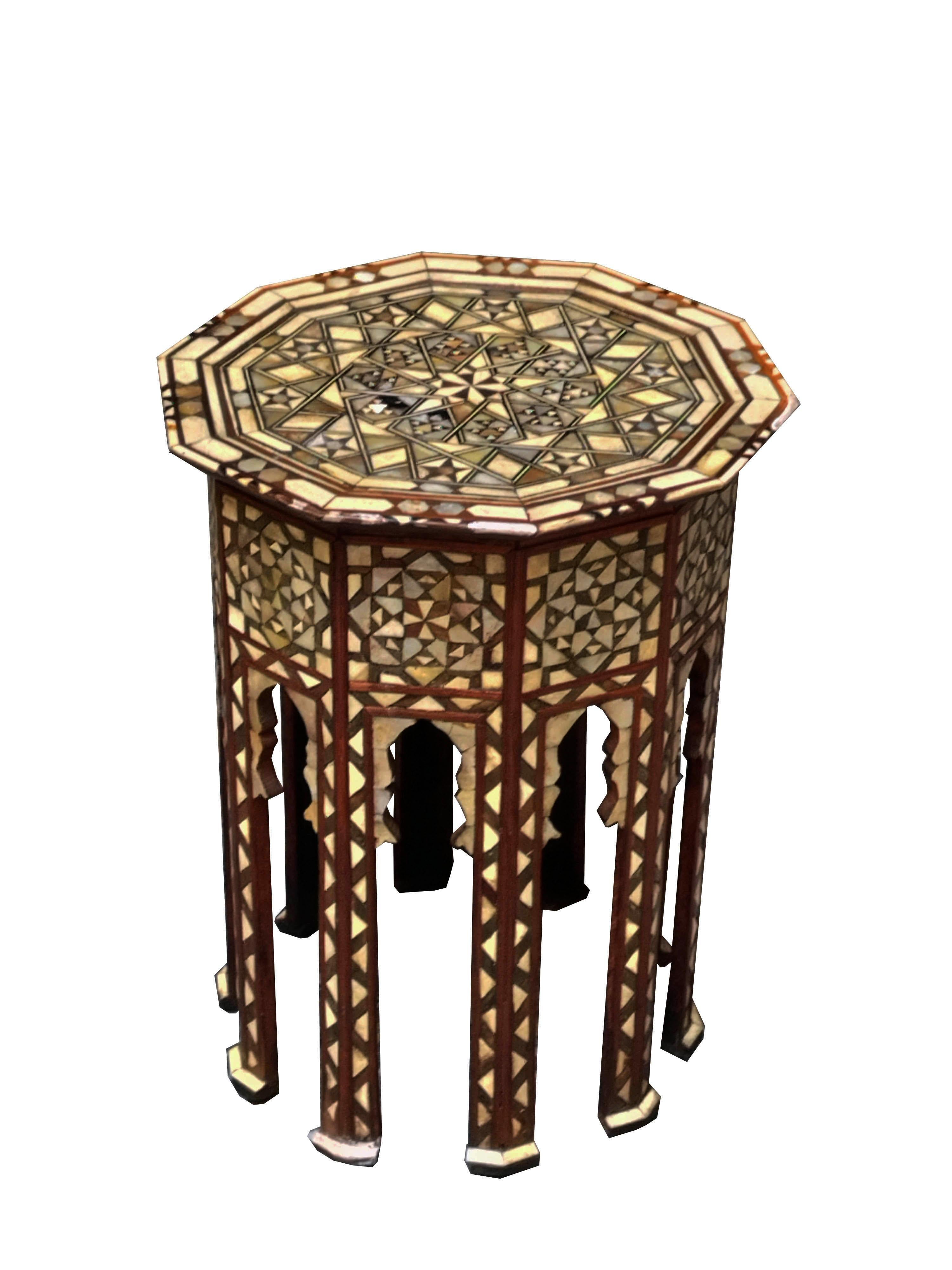 Beautiful Syrian coffee table handcrafted by talented artisans, inlaid with mother-of-pearl interwoven with metal wires.
Features beautiful traditional Middle Eastern motifs.

