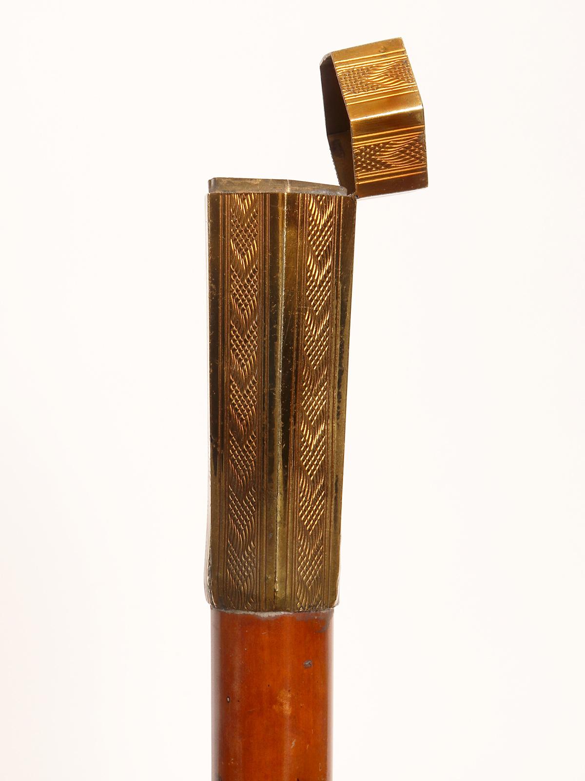 Brass System walking stick, matches candle holder, France 1900.  For Sale