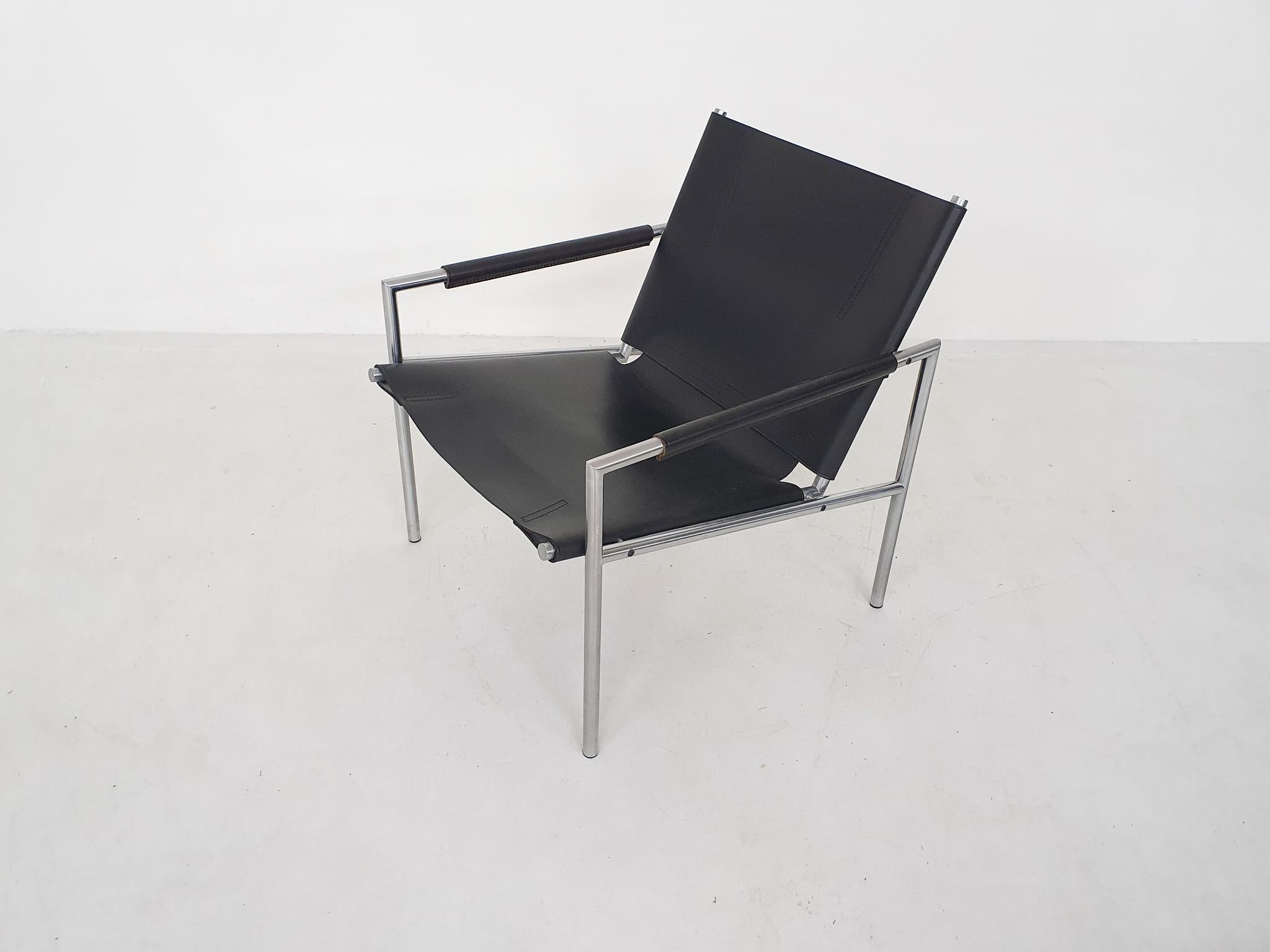 Designed in 1964 by Martin Visser for 't Spectrum in the Netherlands.
Metal frame and black saddle leather seating and back. This is a newer model.

Martin Visser was one of the leading Dutch designers of the midcentury together with Cees