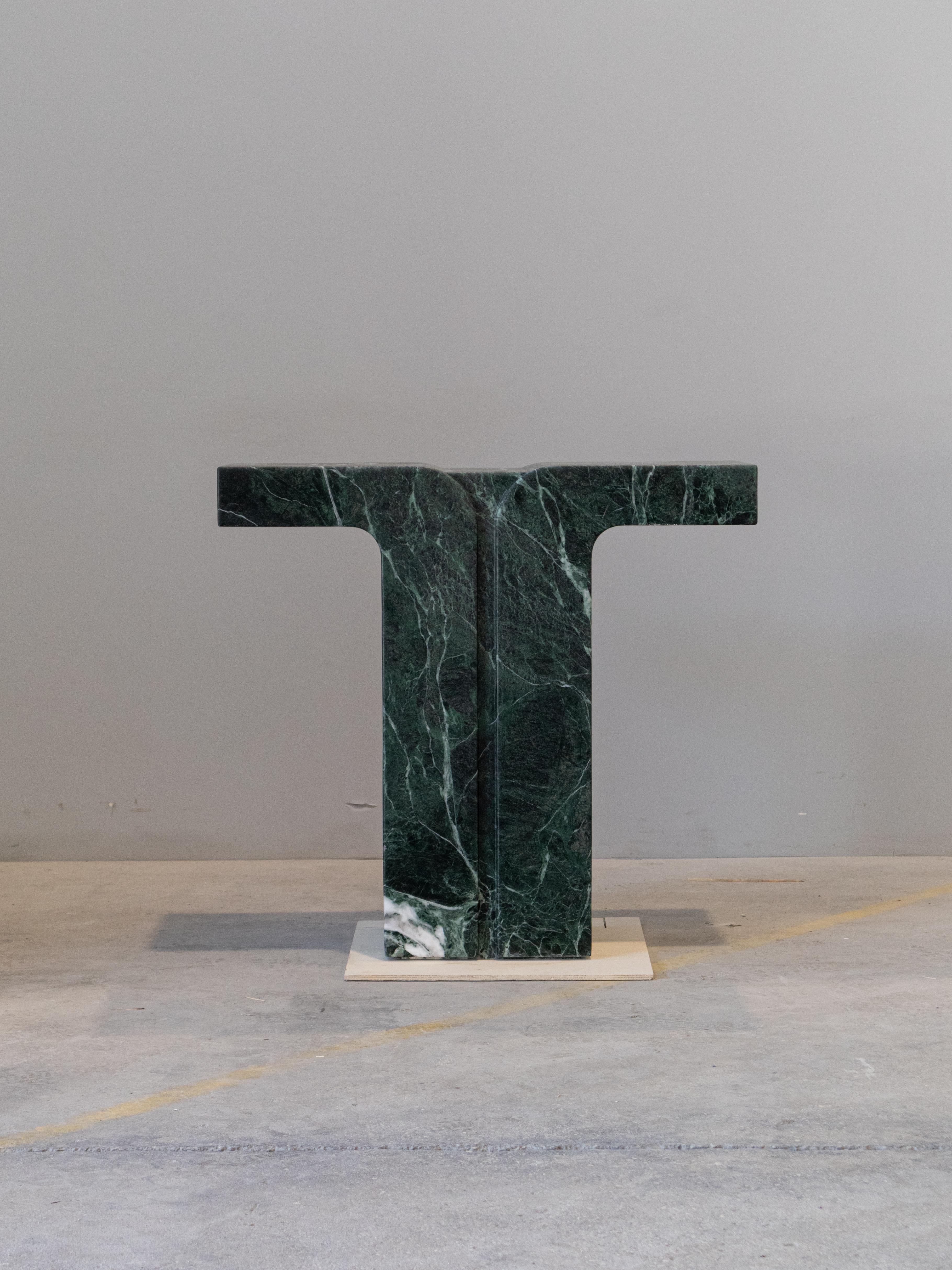 Fully appreciate all the beauty of marble, thanks to a console carved entirely from a single block of marble the T console is an elegant and luxurious design object that can enhance its surroundings, illuminating it with a refined aura given by the