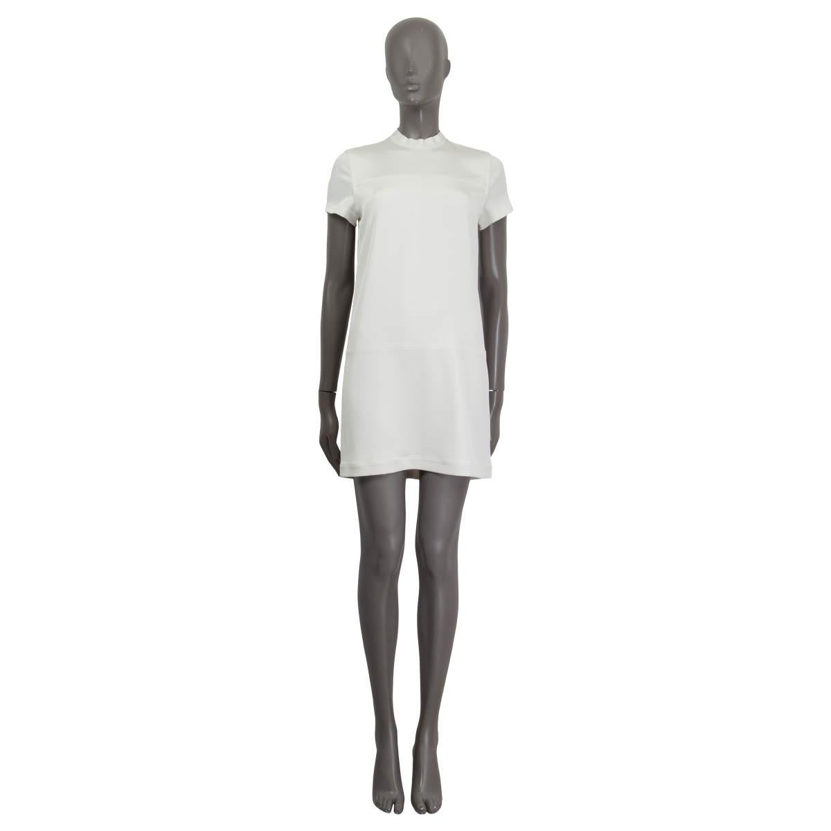 100% authentic T Alexander Wang short sleeve paneled dress in white triacetate (75%) and polyester (25%). Opens with a zipper on the back. Lined in white polyester (100%). Has been worn and is in excellent condition.

Measurements
Tag
