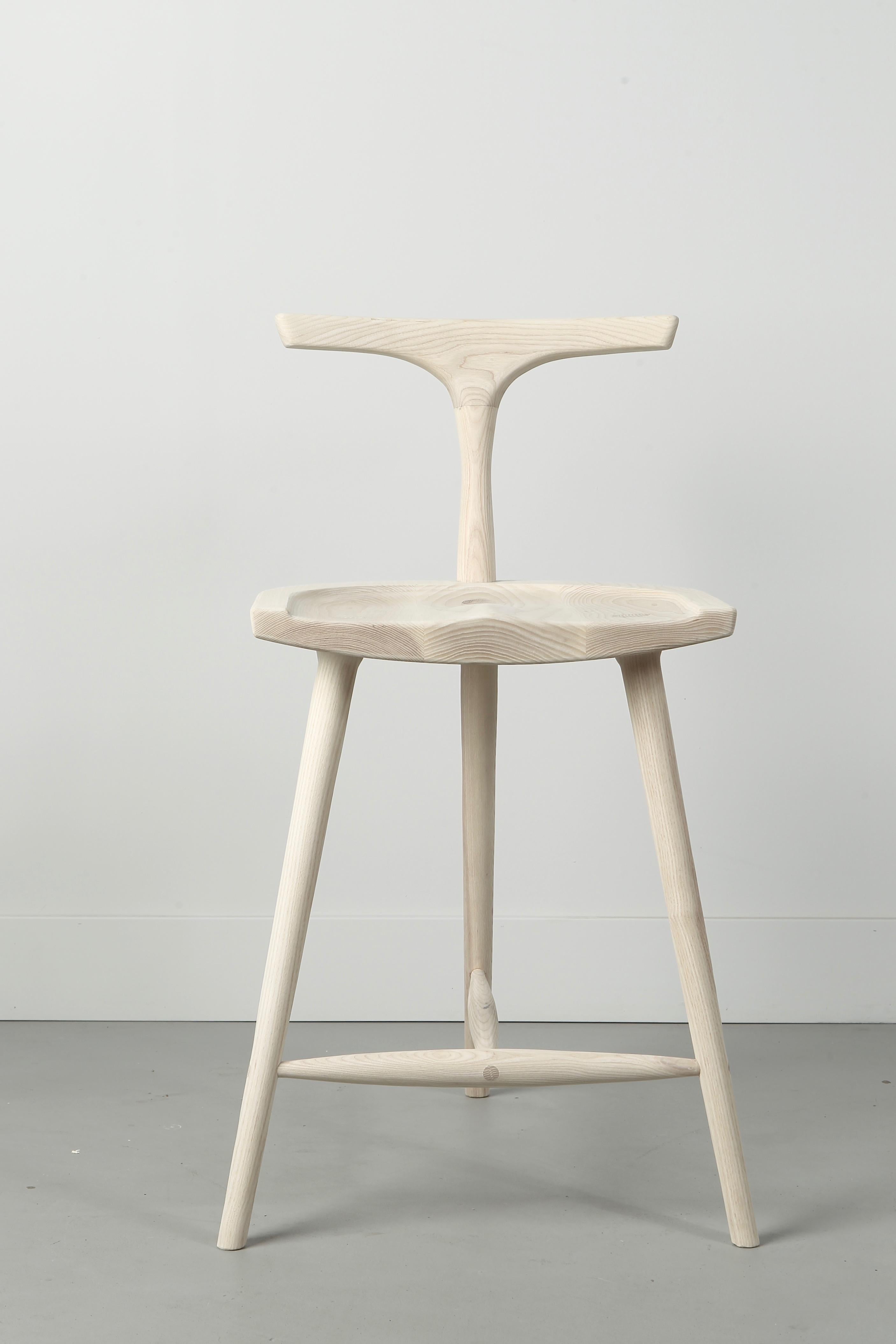 Comfortable, elegant and Classic, a design that will beautifully suit any home interior. Crafted from solid American ash, hand-selected for color uniformity and quality. The Krane stool features a generously sized, ergonomically sculpted seat with a