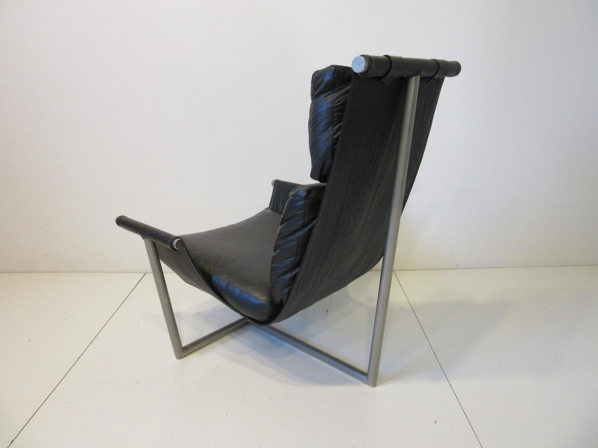 American T Backed Sling Lounge Chair by Metropolitan Attub, Brian Kane