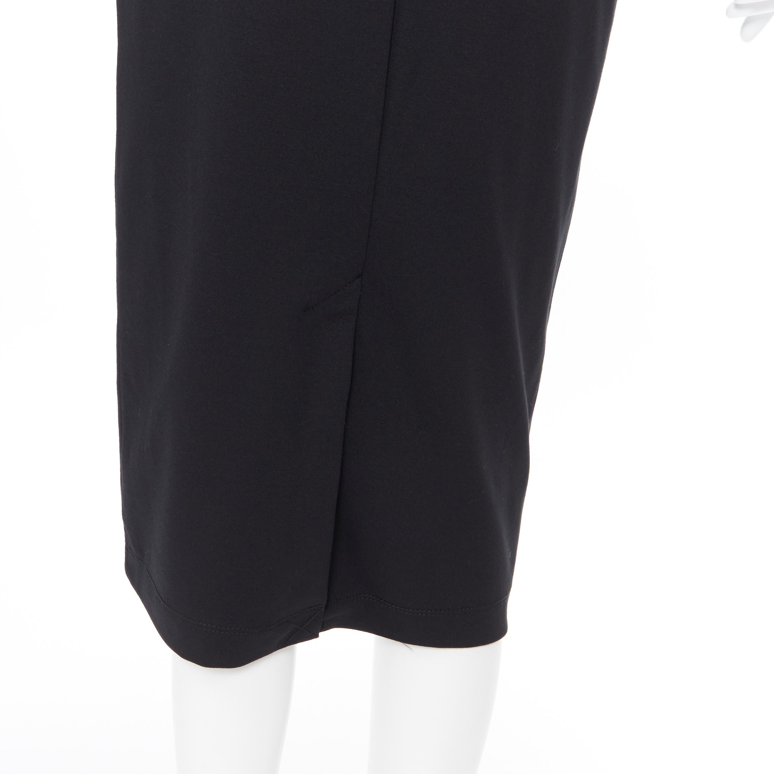 T BY ALEXANDER WANG black rayon polyester center slit stretch pencil skirt S
Brand: T by Aleexander Wang
Designer: Alexander Wang
Model Name / Style: Midi skirt
Material: Rayon, polyester
Color: Black
Pattern: Solid
Closure: Zip
Extra Detail: Center