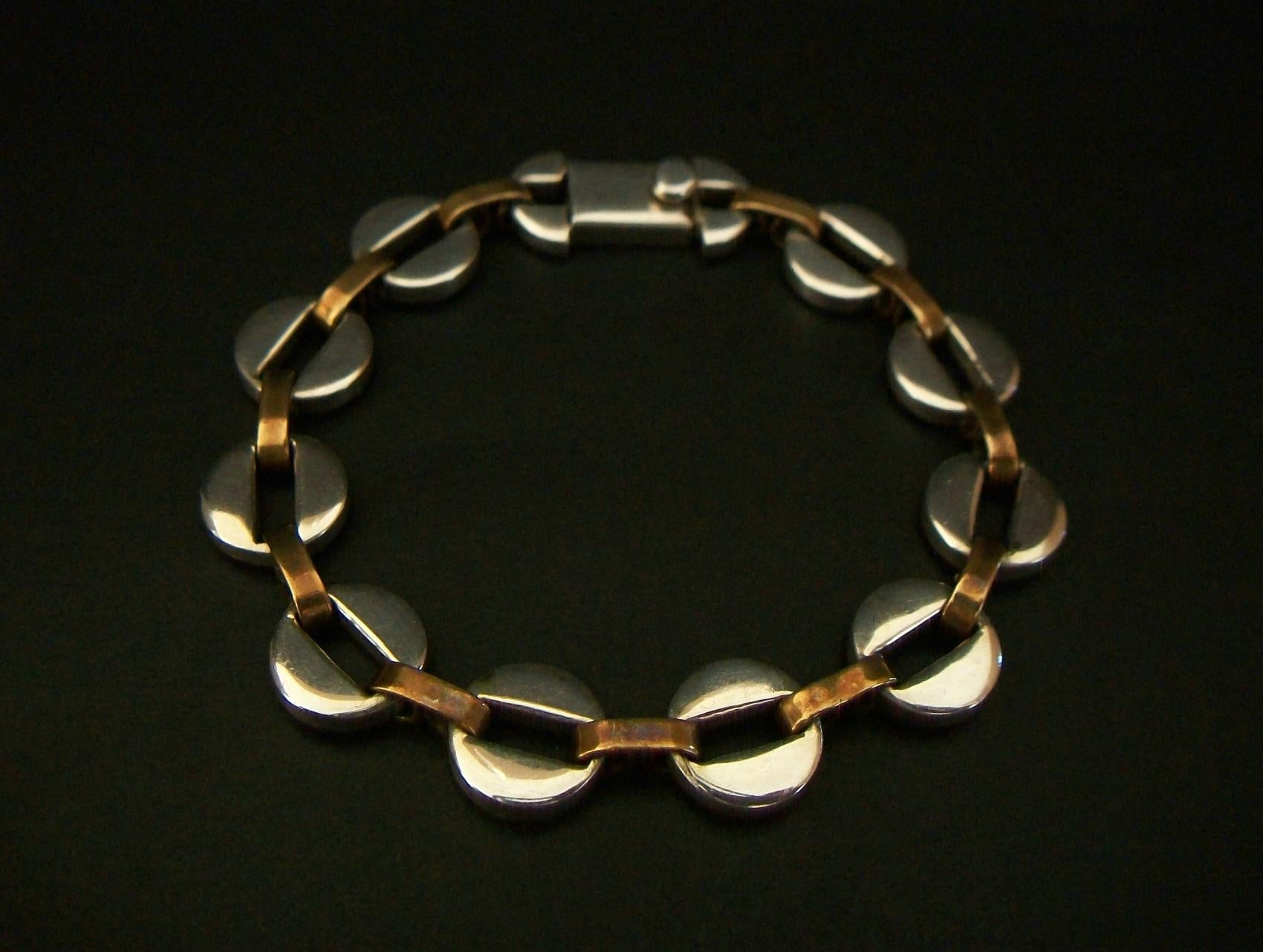 T. CALOS - Mid Century Taxco sterling silver & copper bracelet - fine quality - warm aged patina - hand made box clasp / closure - signed and stamped 925 on the clasp - Mexico - circa 1960's.

Excellent vintage condition - all original - no loss -
