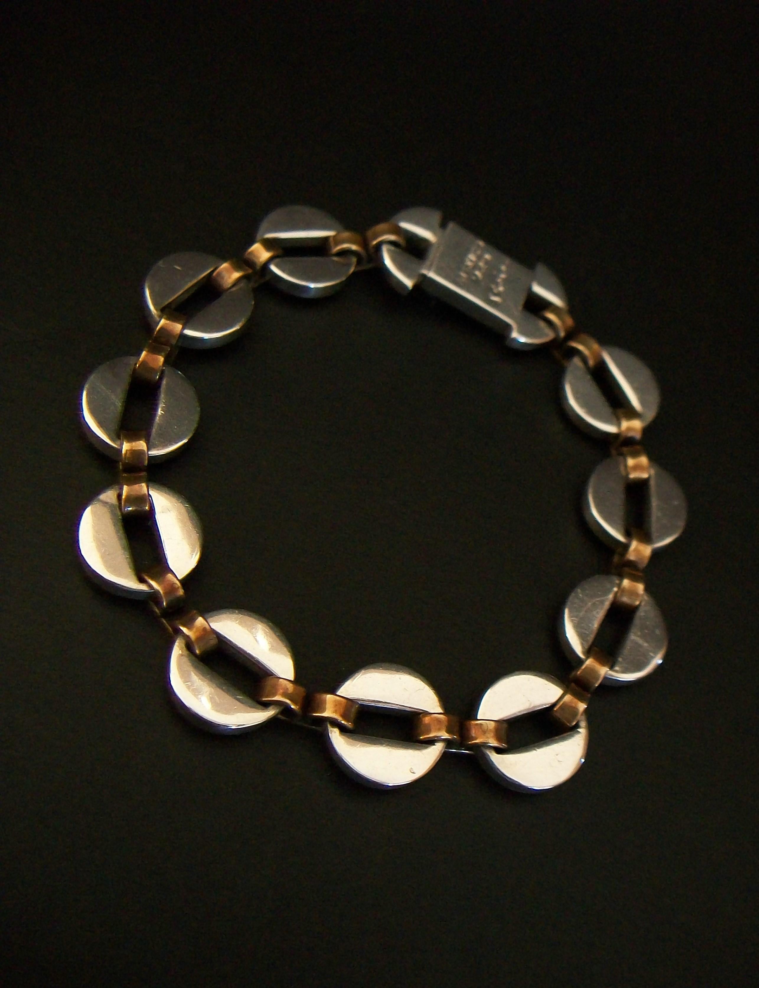 T. Calos, Mid-Century Sterling Silver & Copper Bracelet, Mexico, Circa 1960s In Good Condition For Sale In Chatham, CA