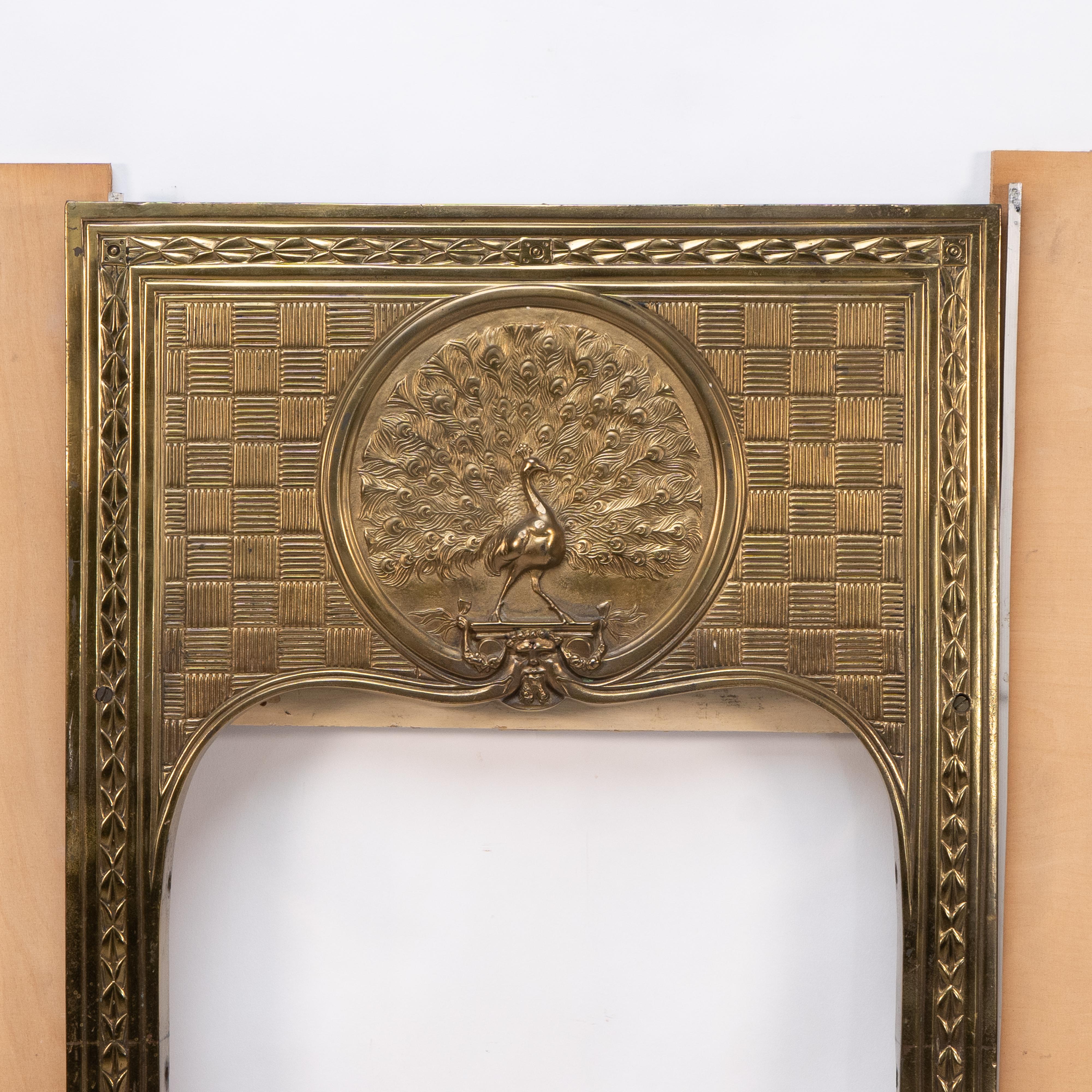 English T. Elsley attri. Aesthetic Movement brass fire insert w. upper central peacock For Sale