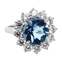 T. Foster & Co Anillo de compromiso de platino con aguamarina y racimo de diamantes