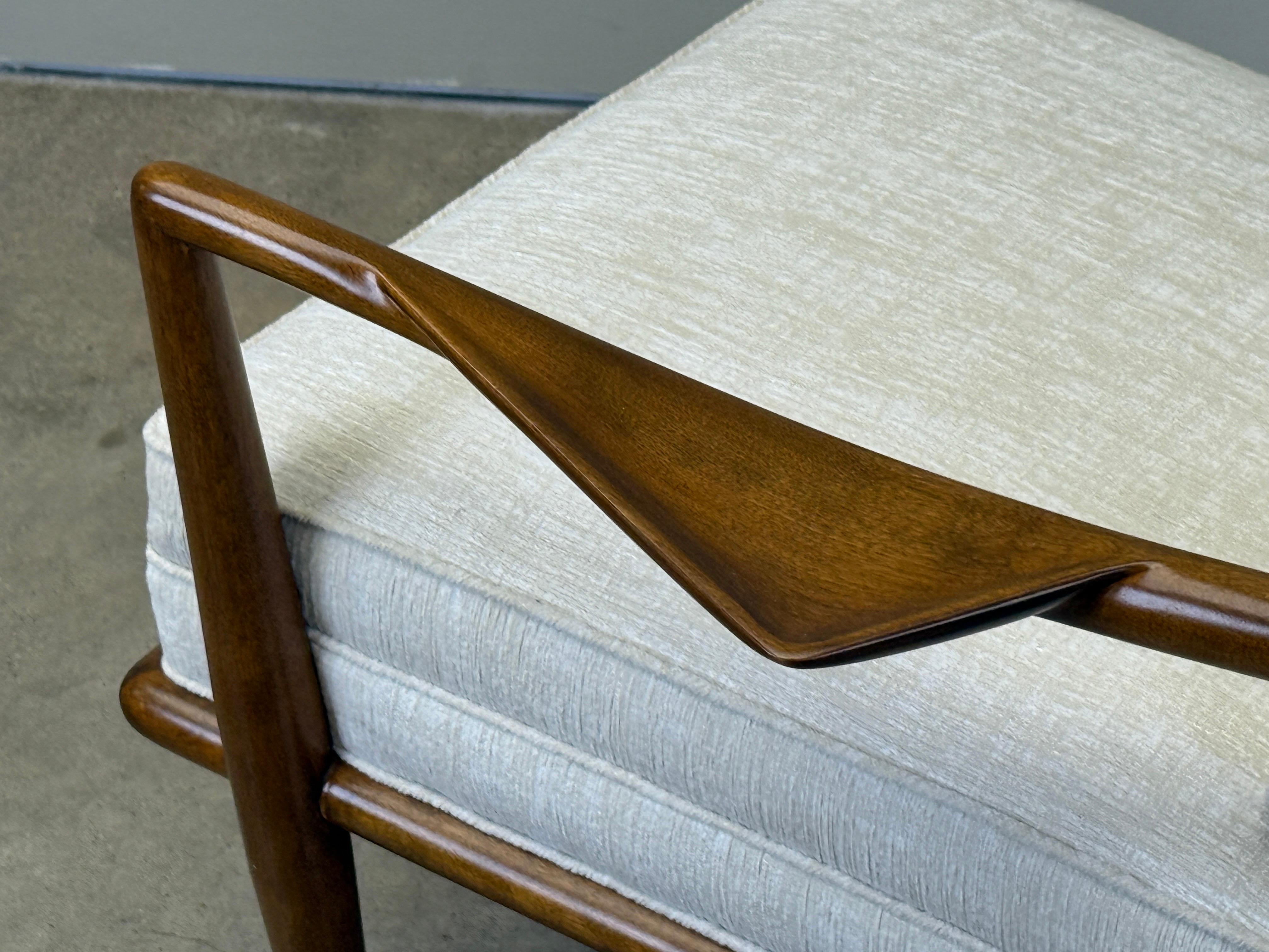 A rare model #1705 sculpted lounge chair designed by T. H. Robsjohn-Gibbings for Widdicomb. Fully restored. 