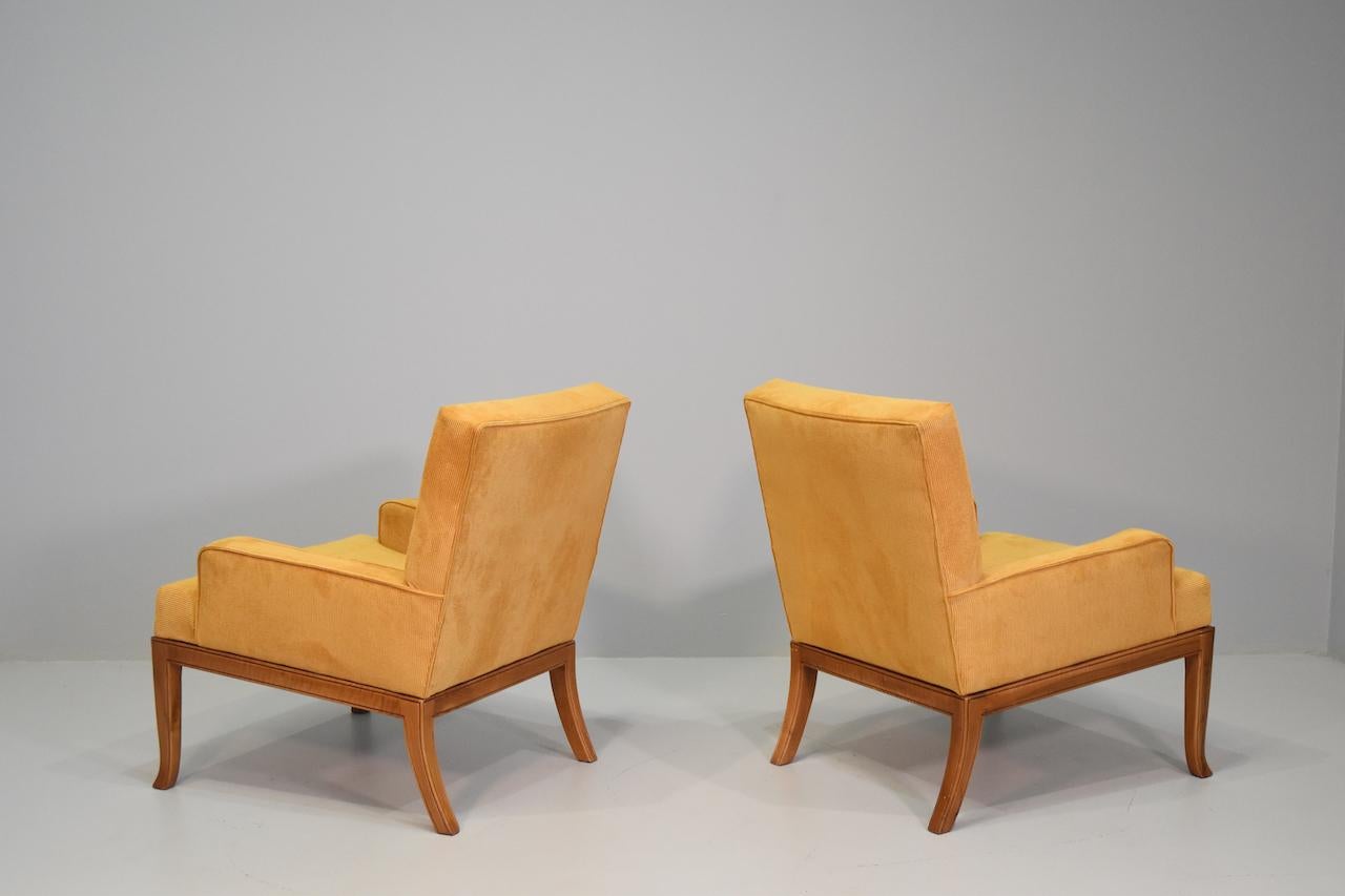 Two elegant lounge chairs that are a classic example of T. H. Robsjohn-Gibbings design, from the 1950s.
 New padded cushions provide excellent seating comfort. 
Gibbings creates with this series of products seats designed in the Greek style, in fact