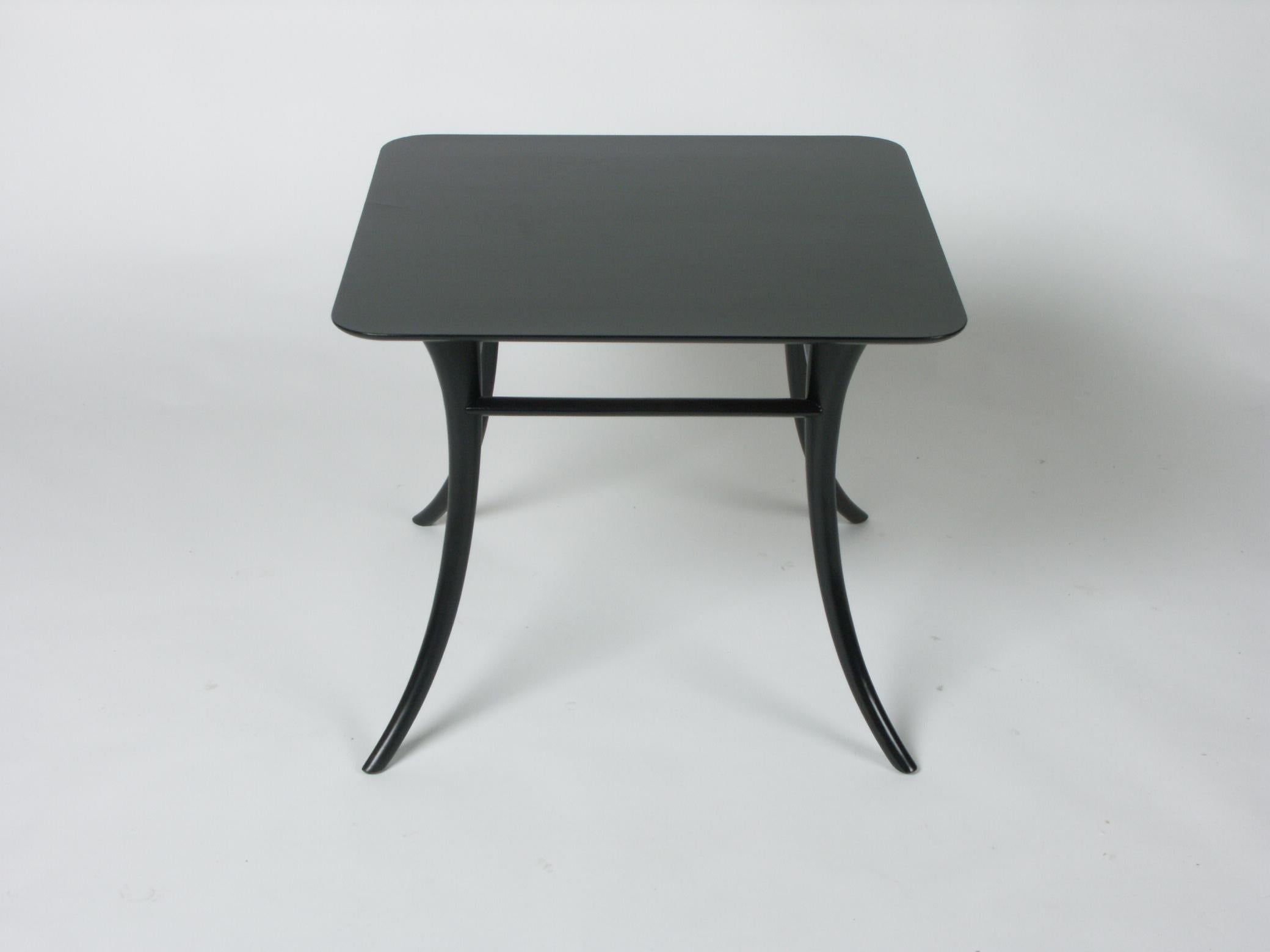 Mid-Century table with elegantly splayed legs designed by Terrance Harold Robsjohn-Gibbings for Widdicomb. Has bee refinished in dark espresso / ebony finish. Label 