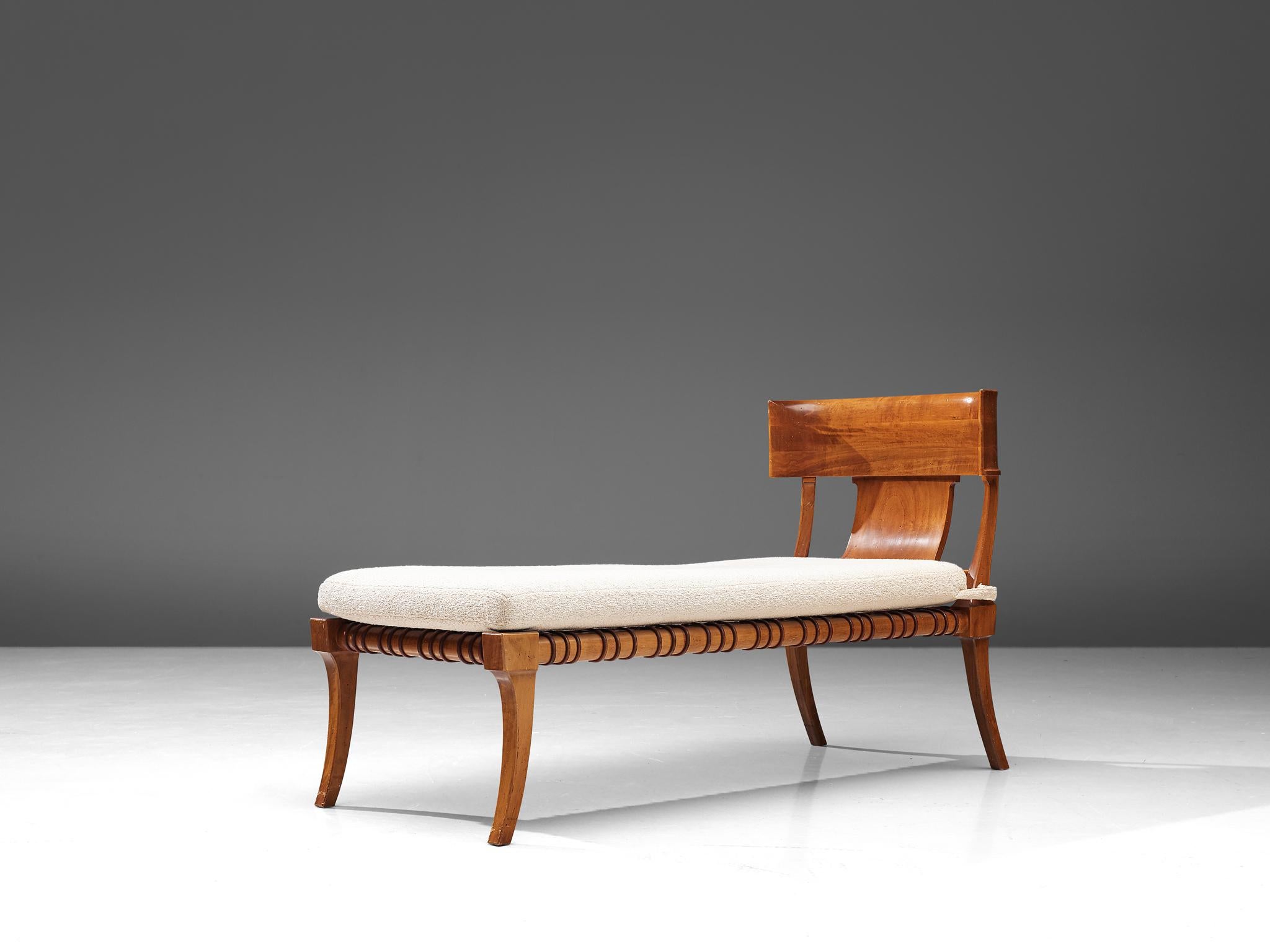 T.H. Robjohn-Gibbings for Saridis of Athens, 'Klini' chaise loungemodel nr. 11, walnut, leather, fabric, United States, 1961

An ancient Greek inspired daybed by the British designer T.H. Robjohn Gibbings. This chaise lounge was part of the