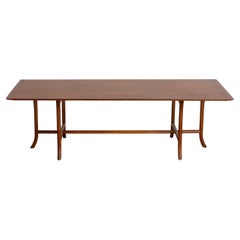 Table basse en acajou à pieds en forme de sabre, de T.H. Robsjohn-Gibbings