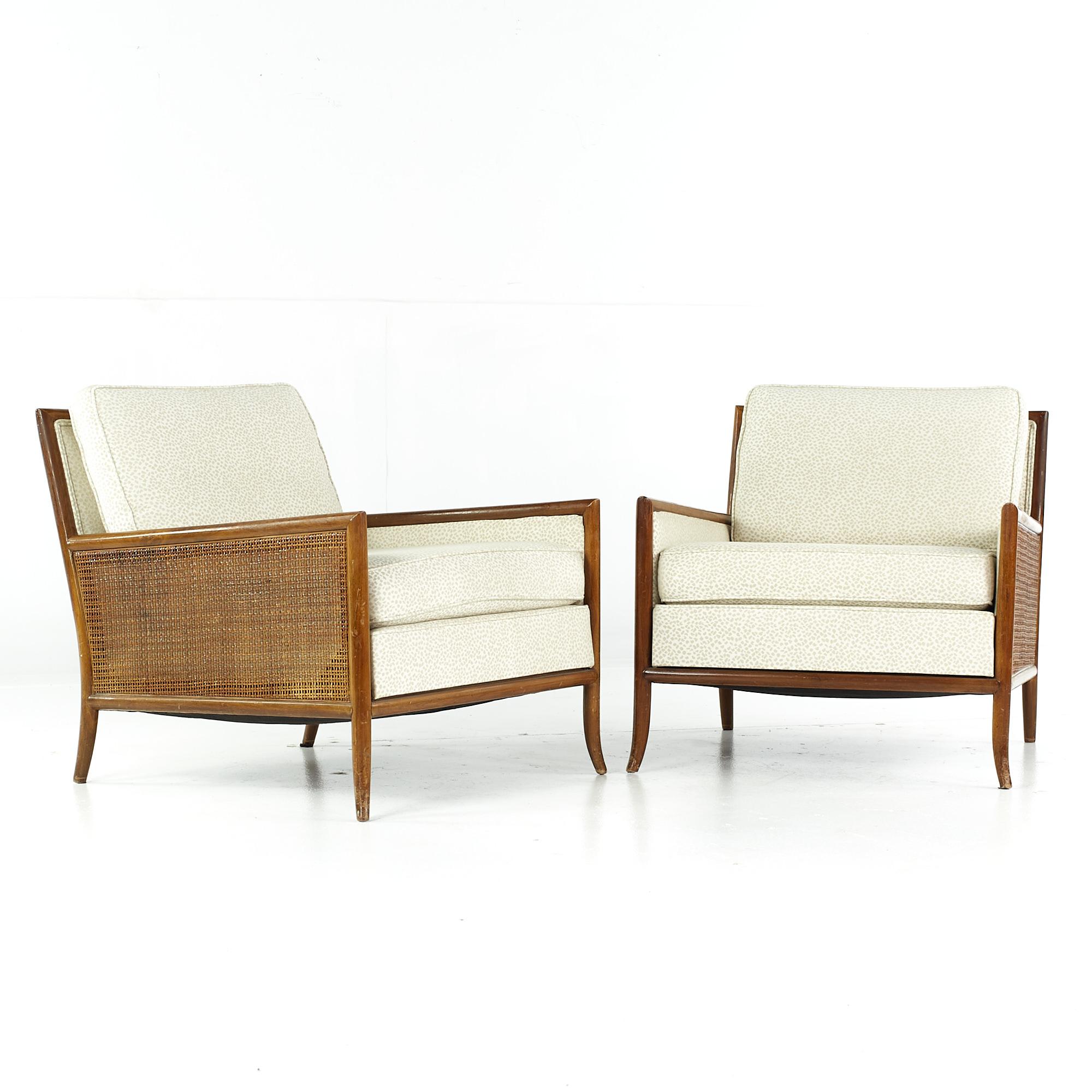 T.H. Robsjohn Gibbings Mid Century Cane Sided Lounge Chairs - Pair

Each chair measures: 27.25 wide x 32 deep x 28 inches high, with a seat height of 17 and arm height/chair clearance of 20 inches

All pieces of furniture can be had in what we call