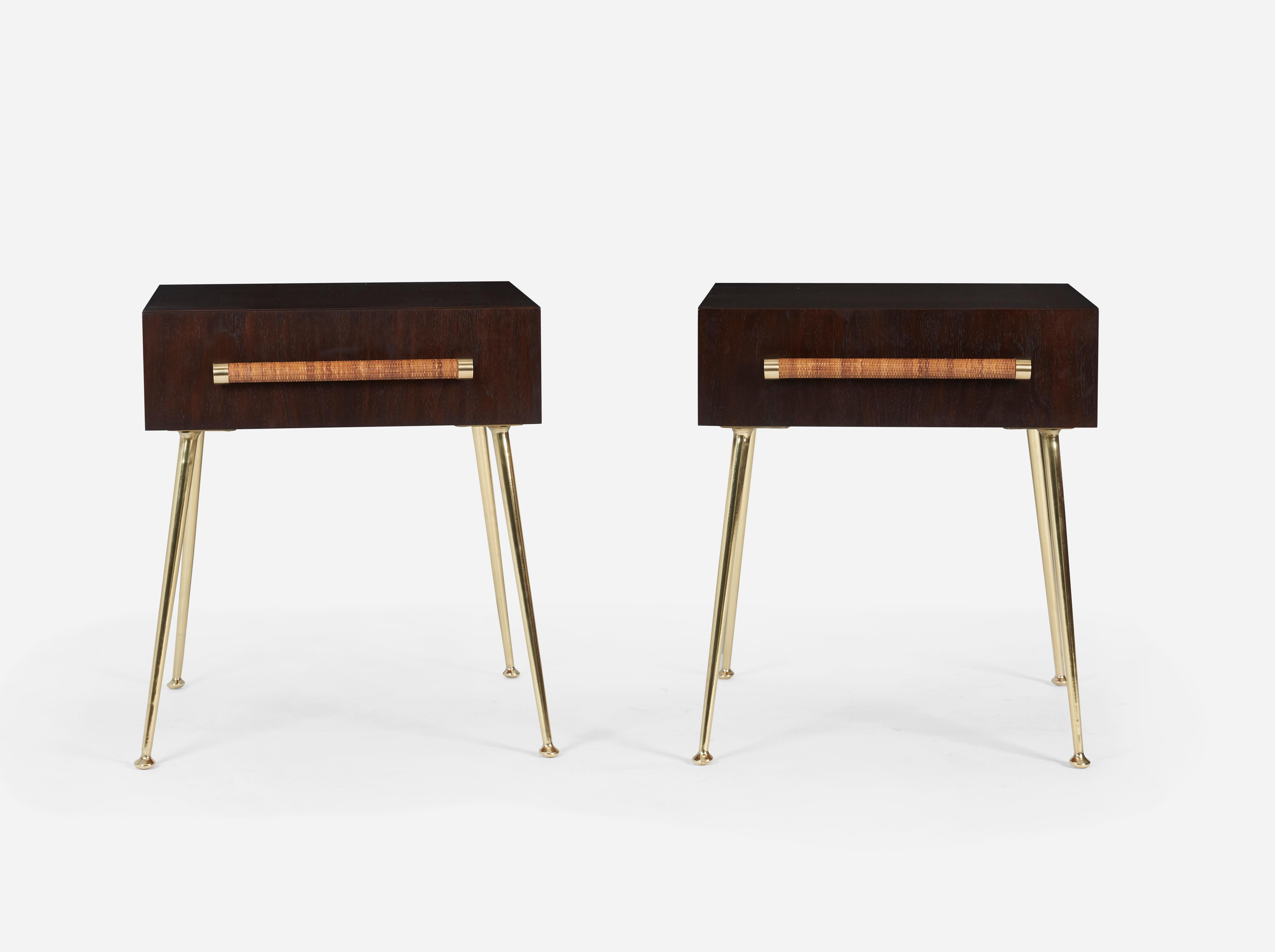 Nightstand/End tables by T. H. Robsjohn-Gibbings for Widdicomb. Fully restored and refinished. Dark walnut cases over long brass legs. Cane wrapped handles with brass accents.