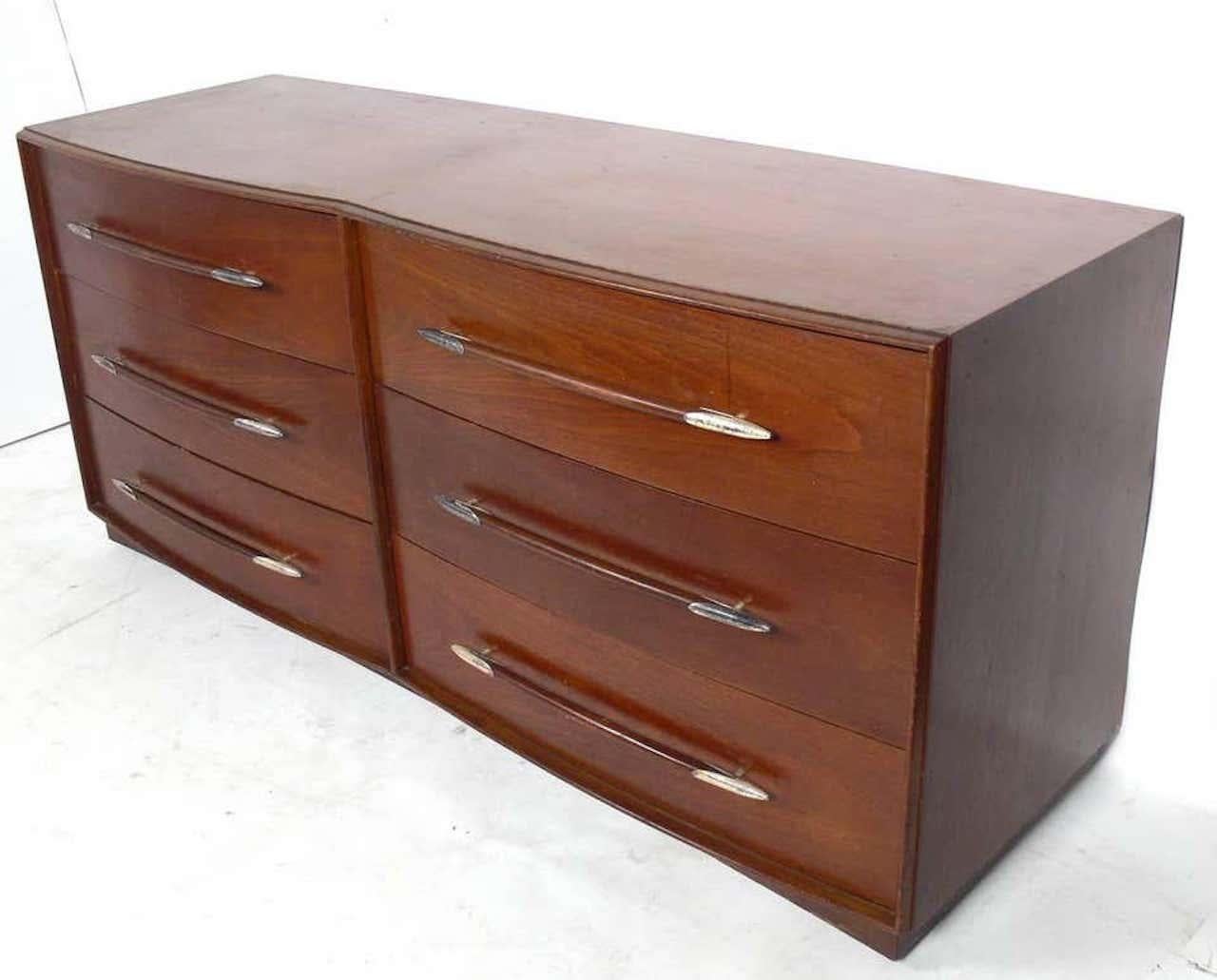 Midcentury 6-drawer double bowed front walnut dresser with stylized spear handles tipped in polished nickel points.