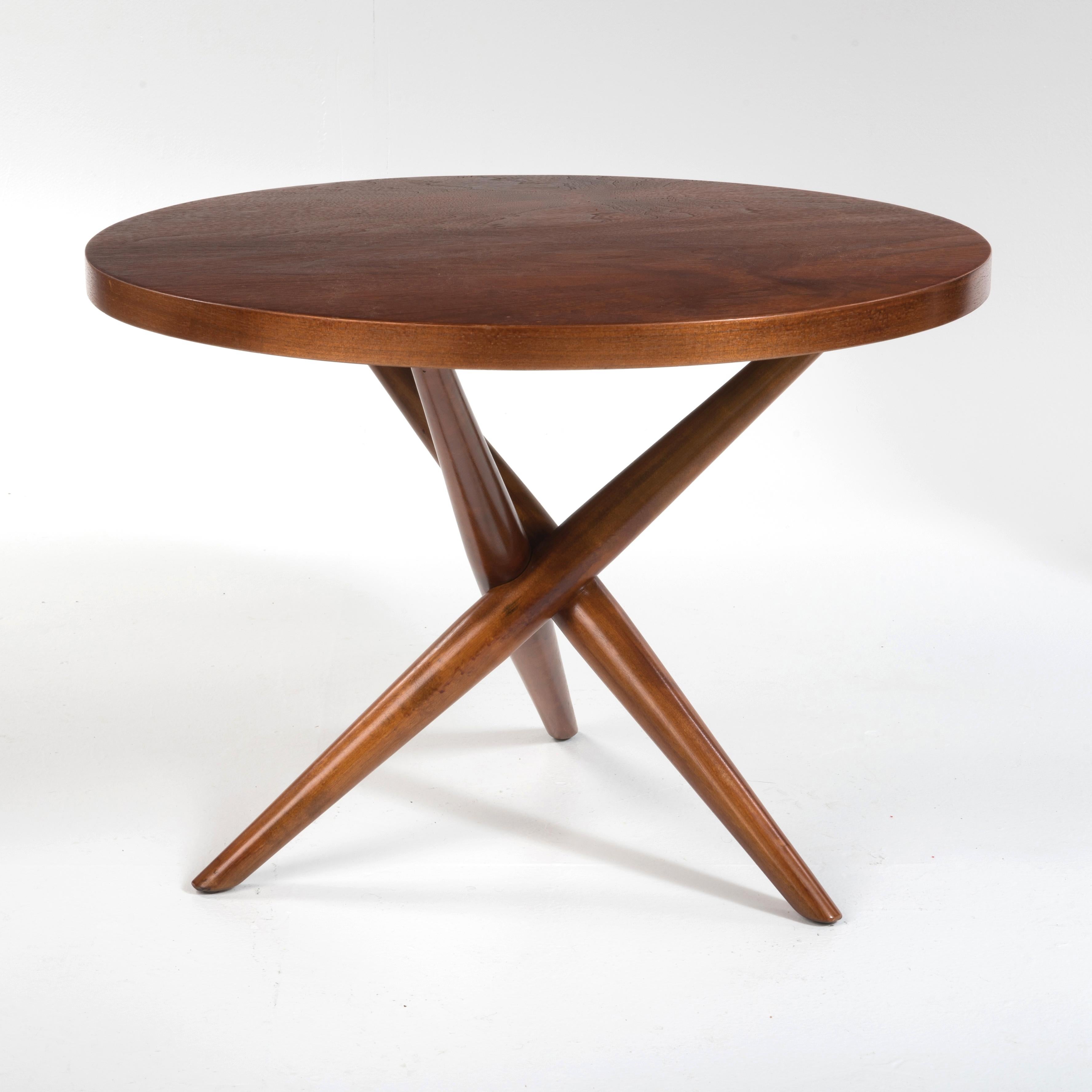 An iconic tripod table designed by T.H. Robsjohn-Gibbings for Widdicomb, 1954.