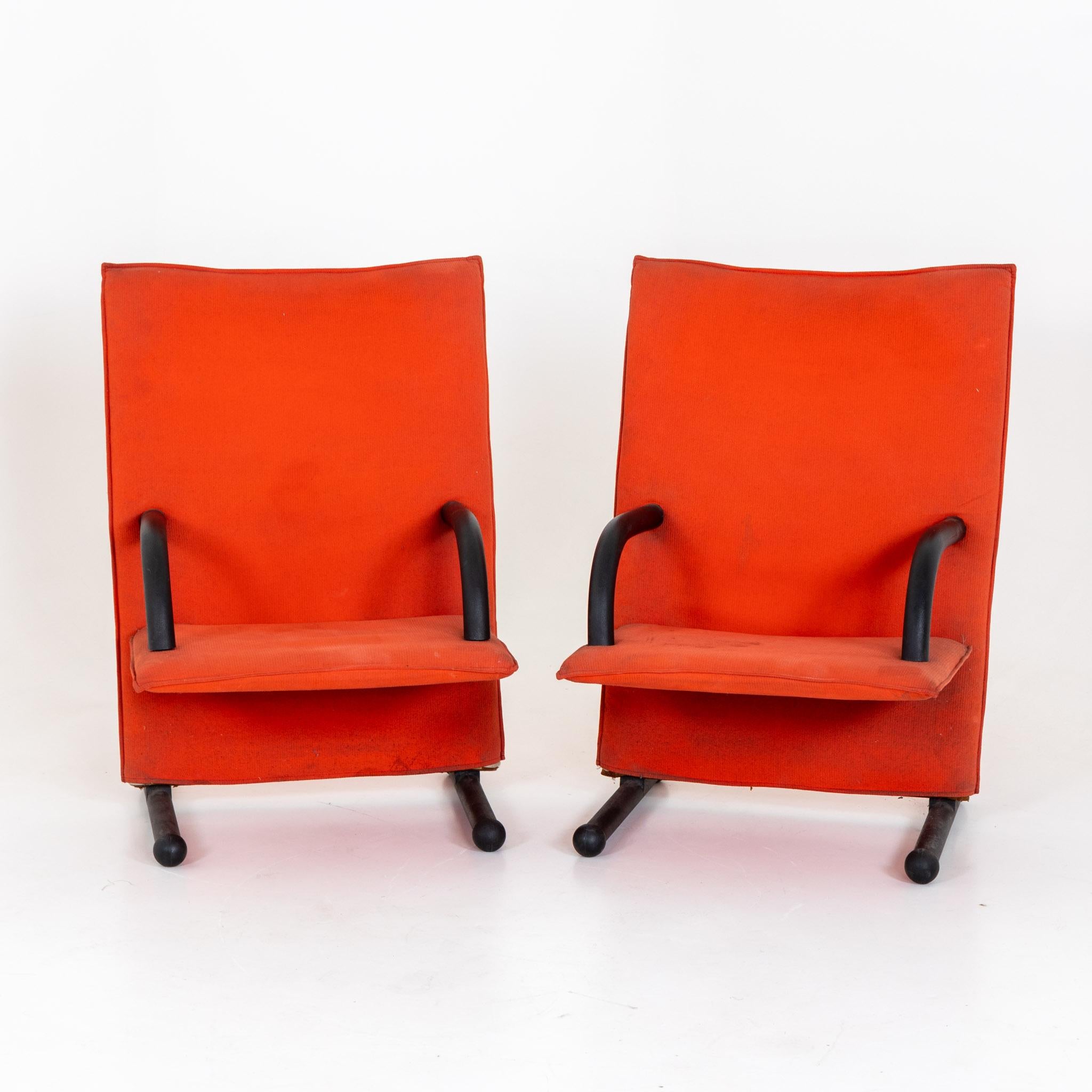 Pair of T-Line arm chairs with black metal frame and red cover by Burkhard Vogtherr for Arflex. Signs of age and use.