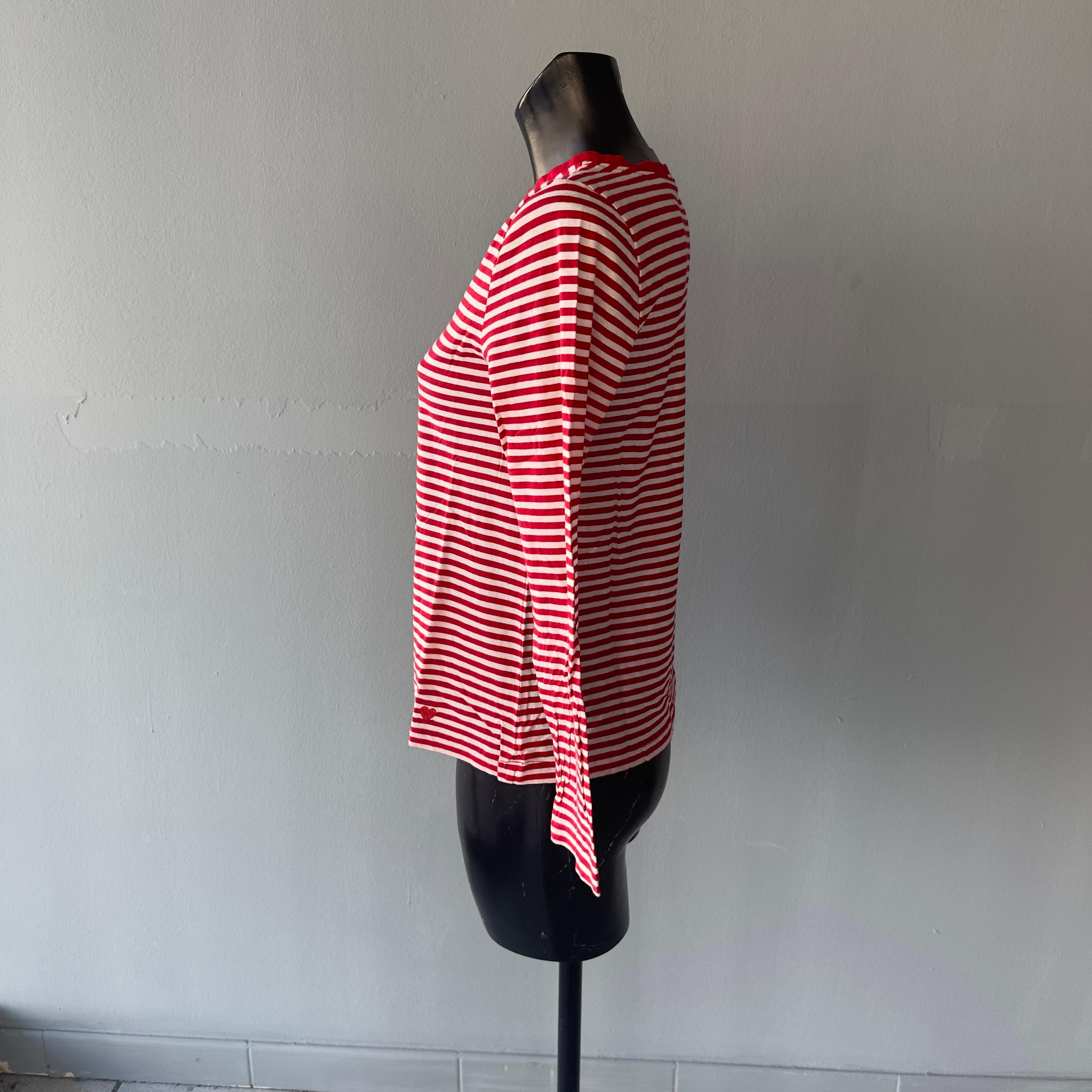 Moschino CheapandChic long-sleeve red and white striped T-shirt with black front lettering. 
Comfortable and lightweight suitable for cool summer evenings or mid-season, beautiful with jeans or skirt 
Boat neck, size 42
Measurements :
Shoulders