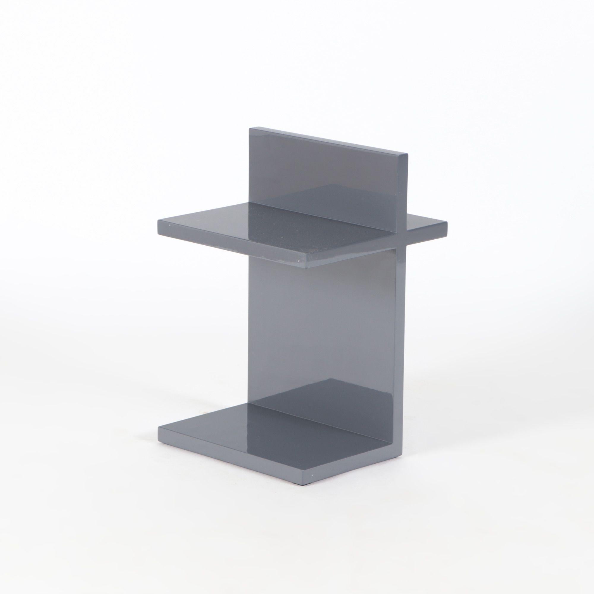 Designed by Maximilian Eicke for his brand Max ID NY.

These minimalistic side tables are made from Solid teak with high gloss lacquered slate grey finish.

Designed as part of its original collection in 2010, the designer being a tea lover (not