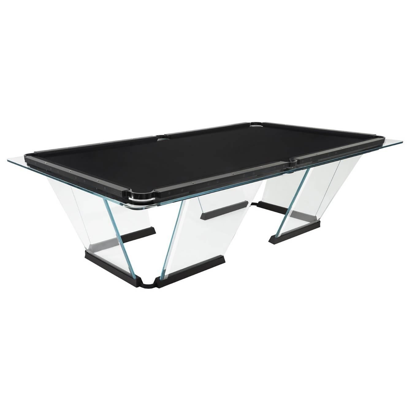T1 is a billiard-pool table made entirely of glass, where the playing surface is specially treated reproducing the friction of traditional cloth.
The feet are sheets of glass bevelled on both sides that self-stabilize, the support is made of solid