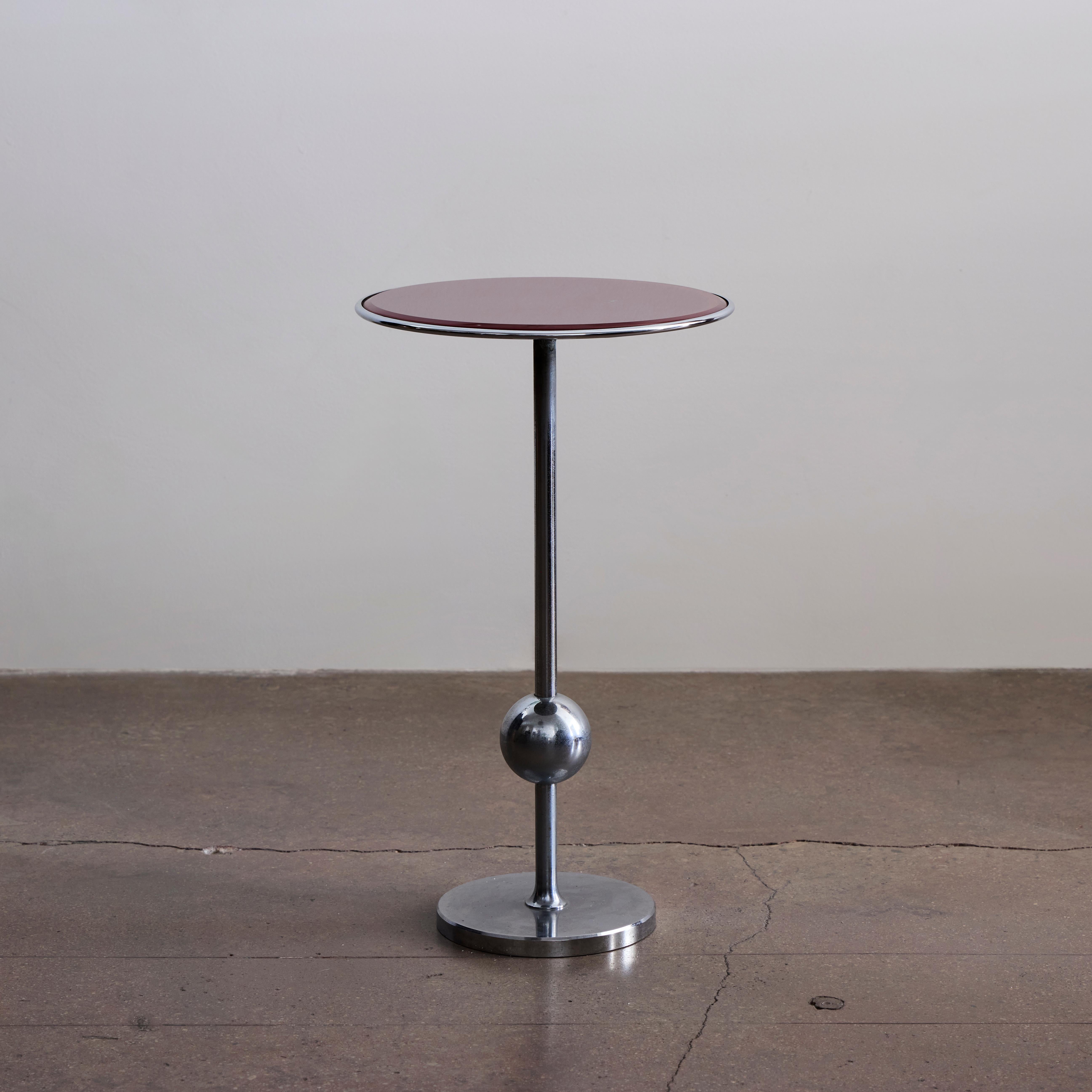 T1 beveled red glass side table by Osvaldo Borsani. Made in Italy circa 1995. Originally designed in the 1940s by Osvaldo Borsani and produced in his own company in Northern Italy, Varedo.

Literature:

 G. Bosoni, Osvaldo Borsani. Architetto,