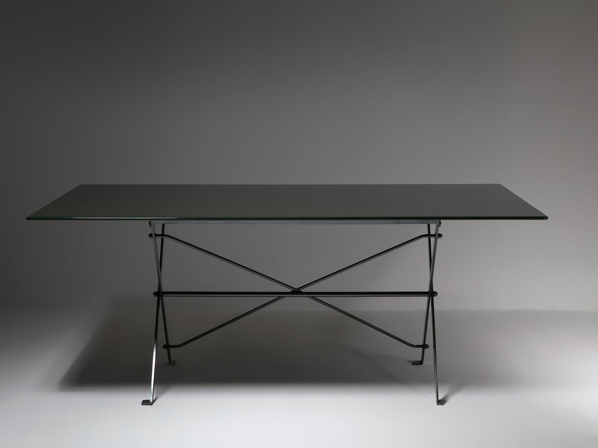 Table model T3 by Luigi Caccia Dominioni for Azucena.
Dark green lacquered top and burnished steel folding trestle. 