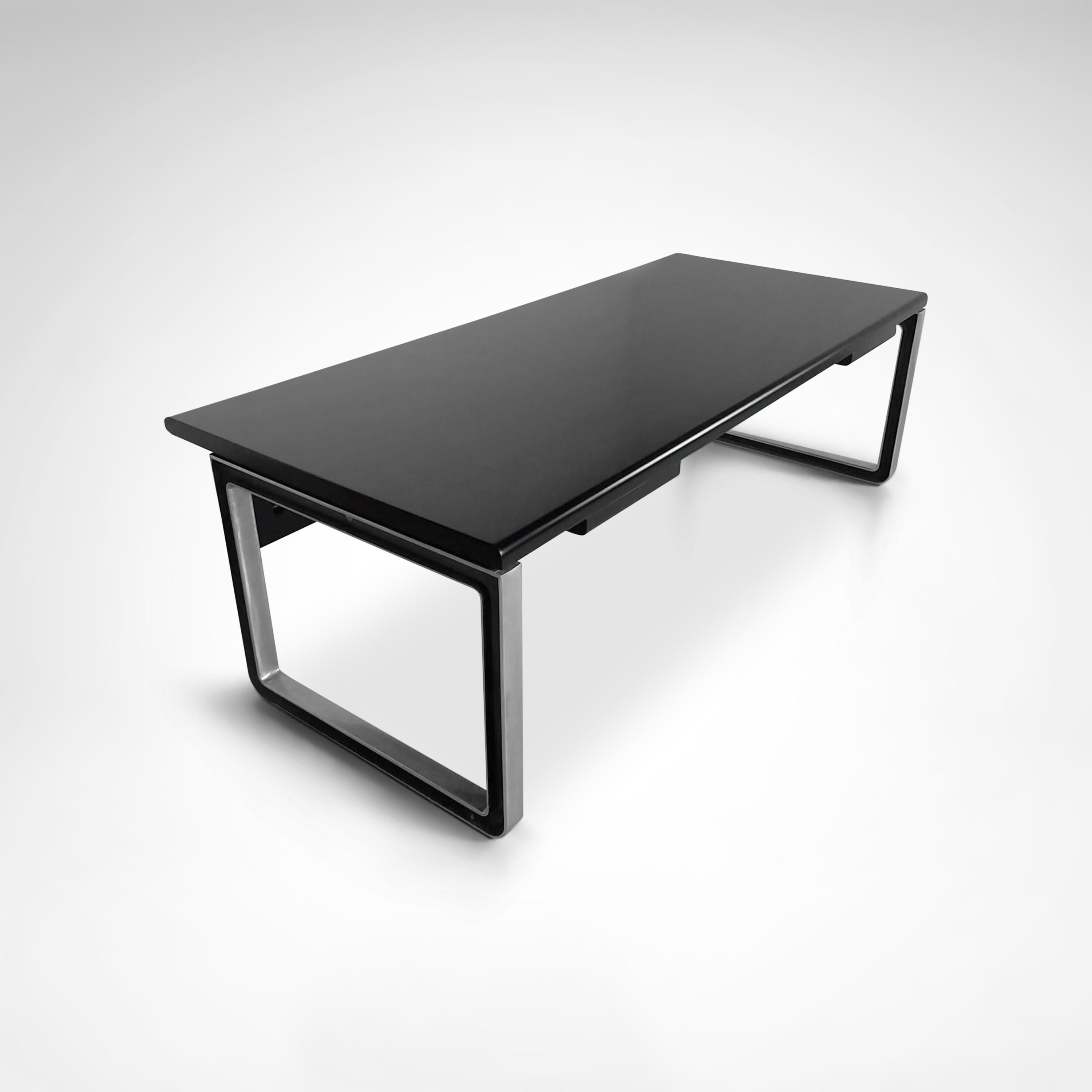 Impressive desk by Eugenio Gerli and Osvaldo Borsani for Tecno SpA, designed in 1975 by Eugenio Gerli and Osvaldo Borsani for Tecno SpA Italy.

It is made with excellent wood and polished steel bases. The top consists of solid walnut wood covered