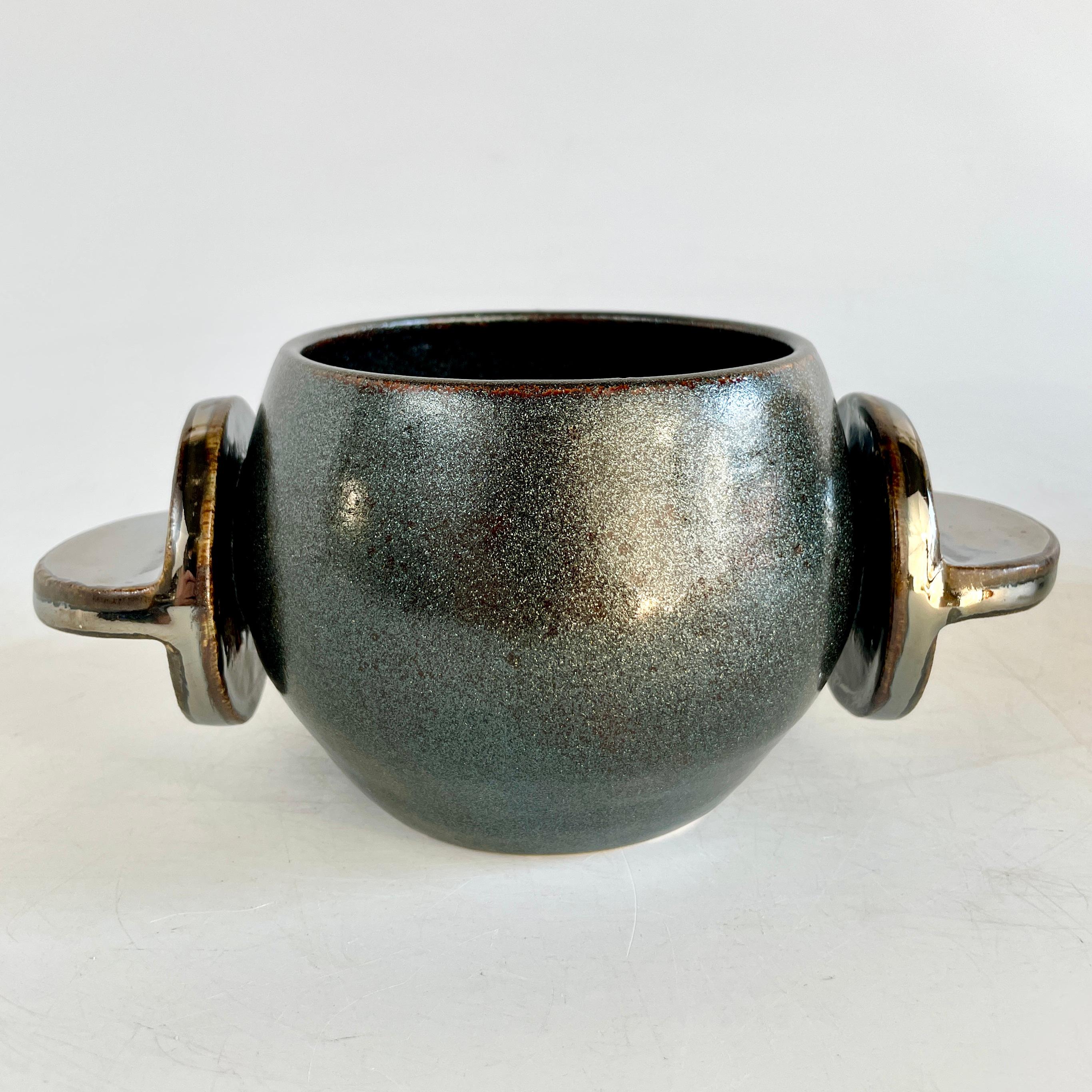 The Tab Orbital, shown here in Diffused China Red/Raven and Broken Silver, the food safe vessel for your favorite beverage of choice, entertaining, or as a decorative object or objet d'art. Versatile, sustainable and one of kind, made of recycled