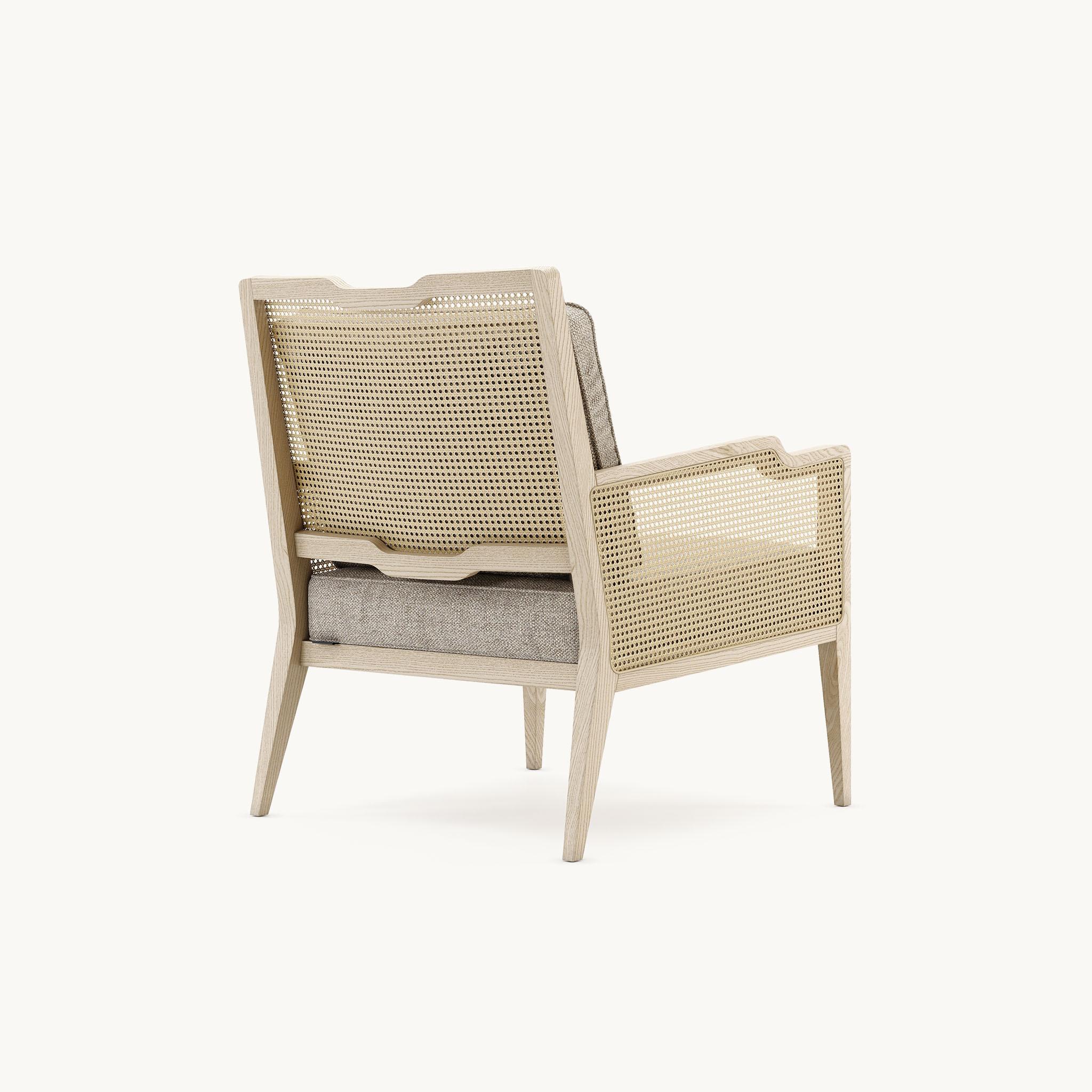 Modern Tabac Ash Lounge Chair With Rattan Detailing On The Back And Arms For Sale
