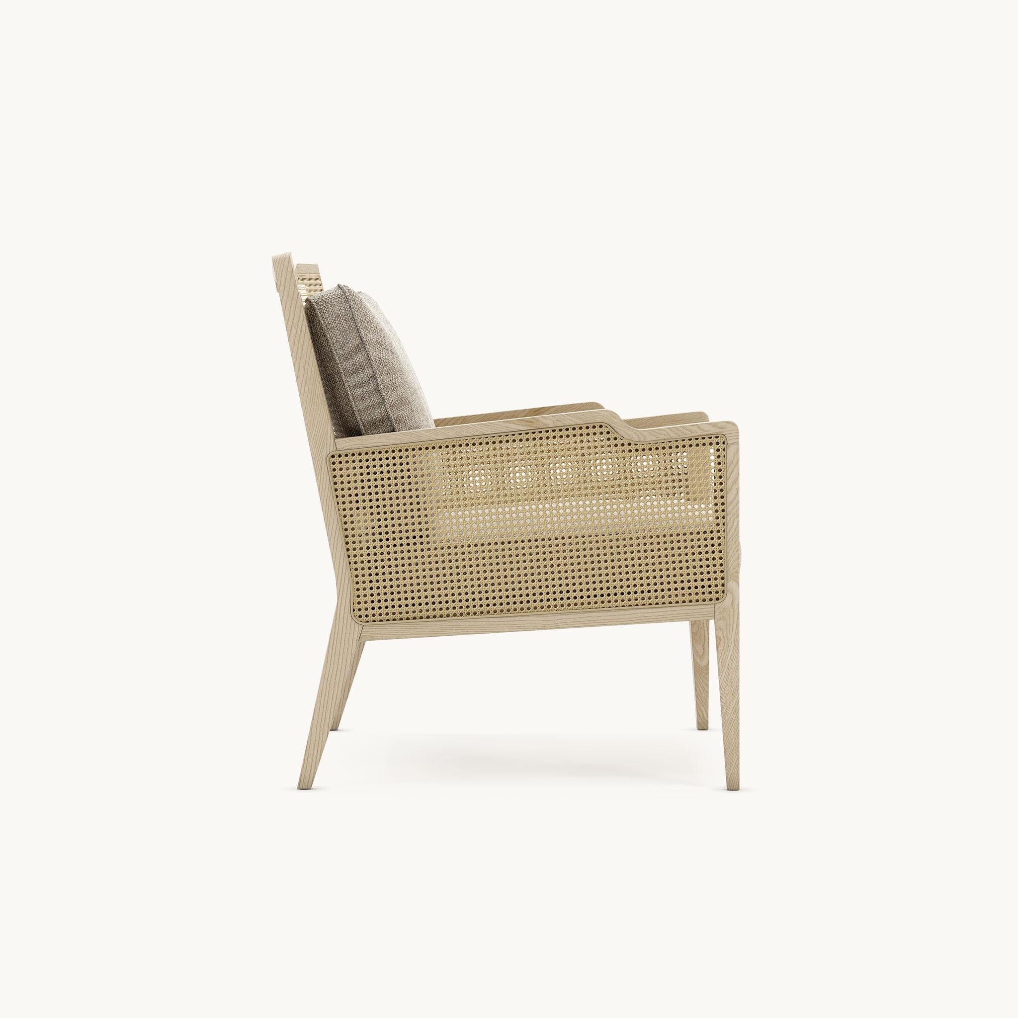 Portuguese Tabac Ash Lounge Chair With Rattan Detailing On The Back And Arms For Sale