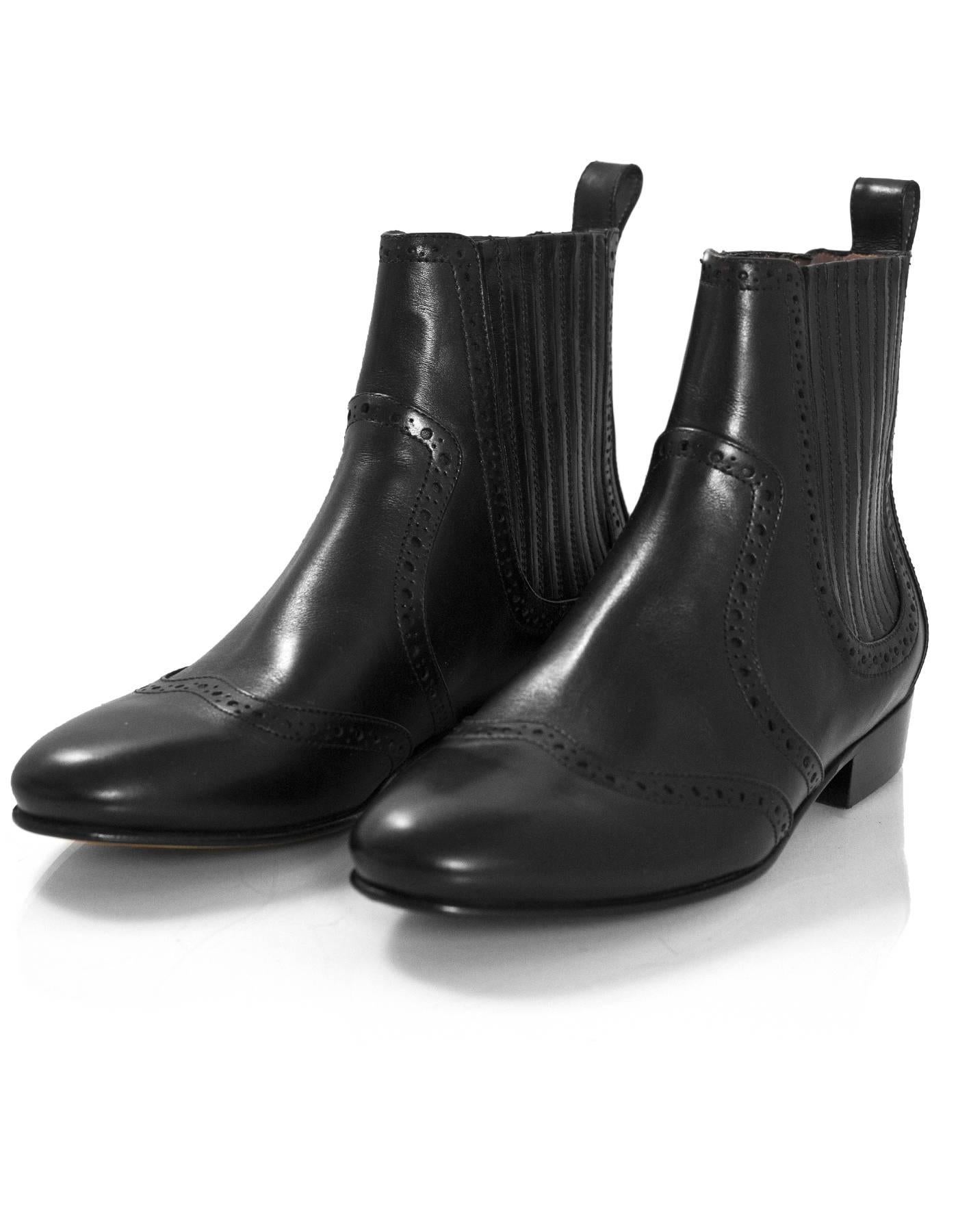 Tabitha Simmons Black Spectator Sibley Ankle Boots Sz 36

Made In: Italy
Color: Black
Materials: Leather
Closure/Opening: Stretch sides
Sole Stamp: Tabitha Simmons made in Italy 36
Retail Price: $795+ tax
Overall Condition: Excellent pre-owned