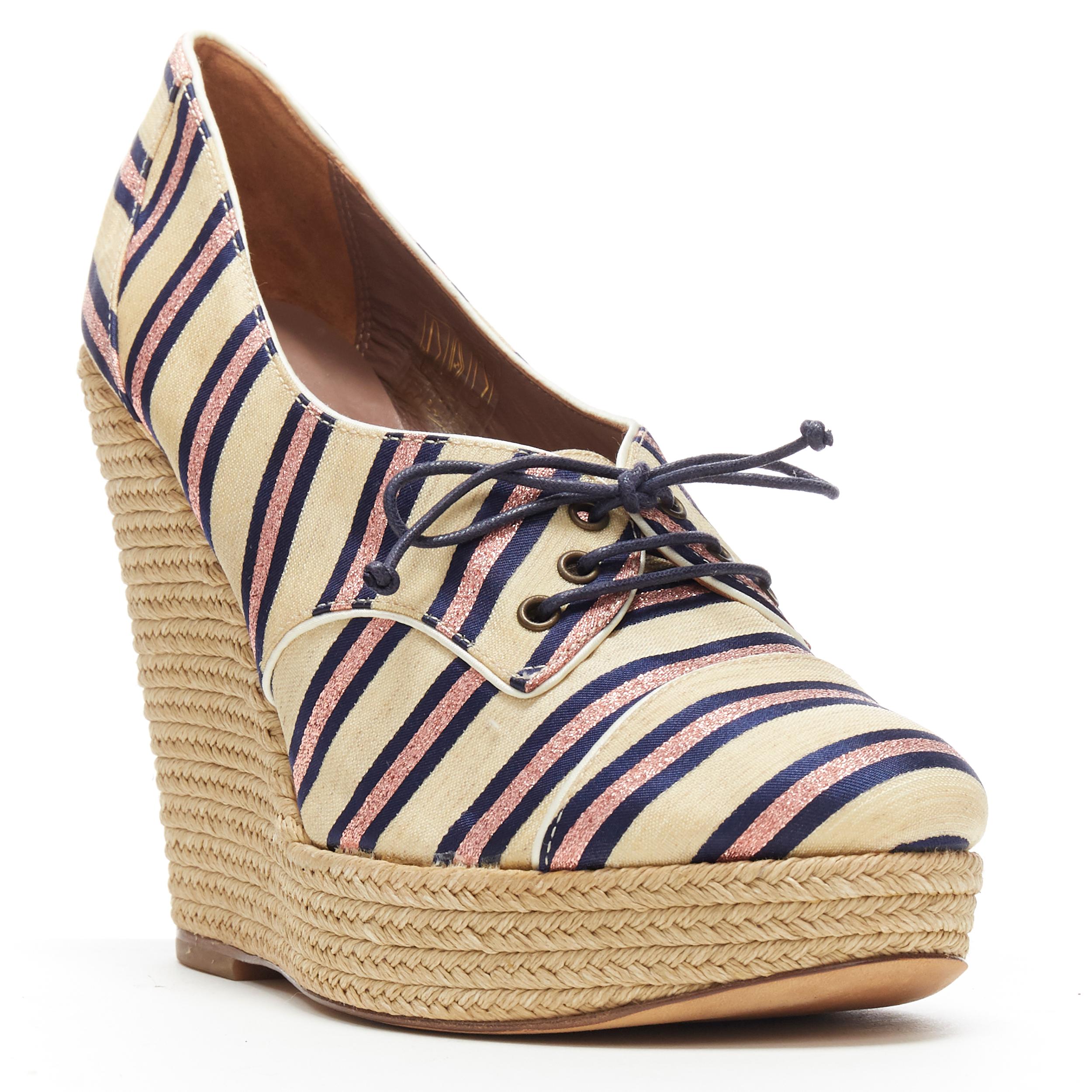 TABITHA SIMMONS metallic pink striped canvas jute platform wedge heel EU37
Brand: Tabitha Simmons
Designer: Tabitha Simmons
Model Name / Style: Wedge
Material: Fabric
Color: Beige; and pink
Pattern: Striped
Closure: Lace up
Lining material: