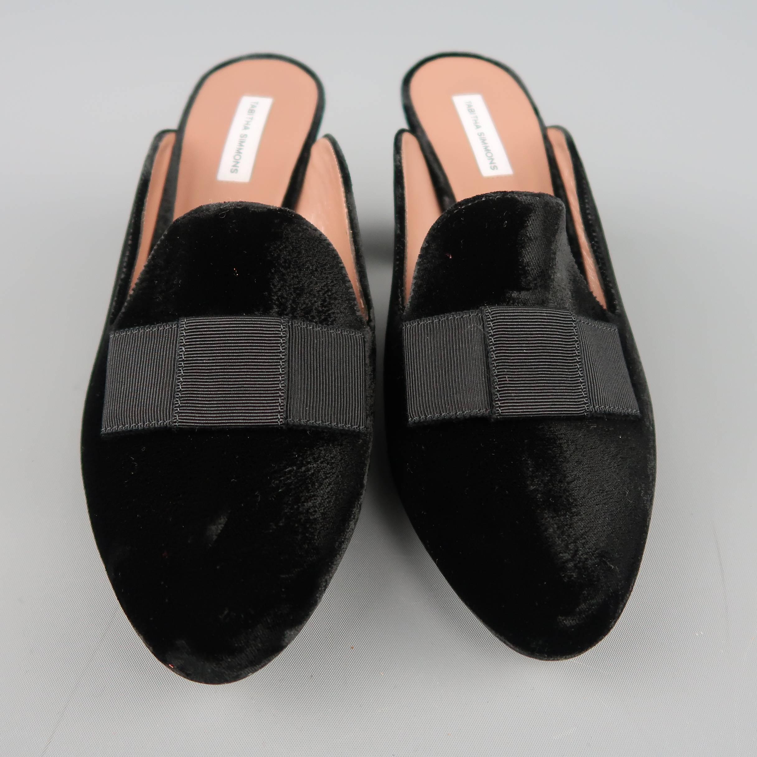 TABITHA SIMMONS mules come in black velvet with a grosgrain ribbon bow and chunky covered heel. Never worn. Made in Italy.
 
New without Tags.
Marked: IT 40
 
Measurements:
 
Heel: 3.45 in.
