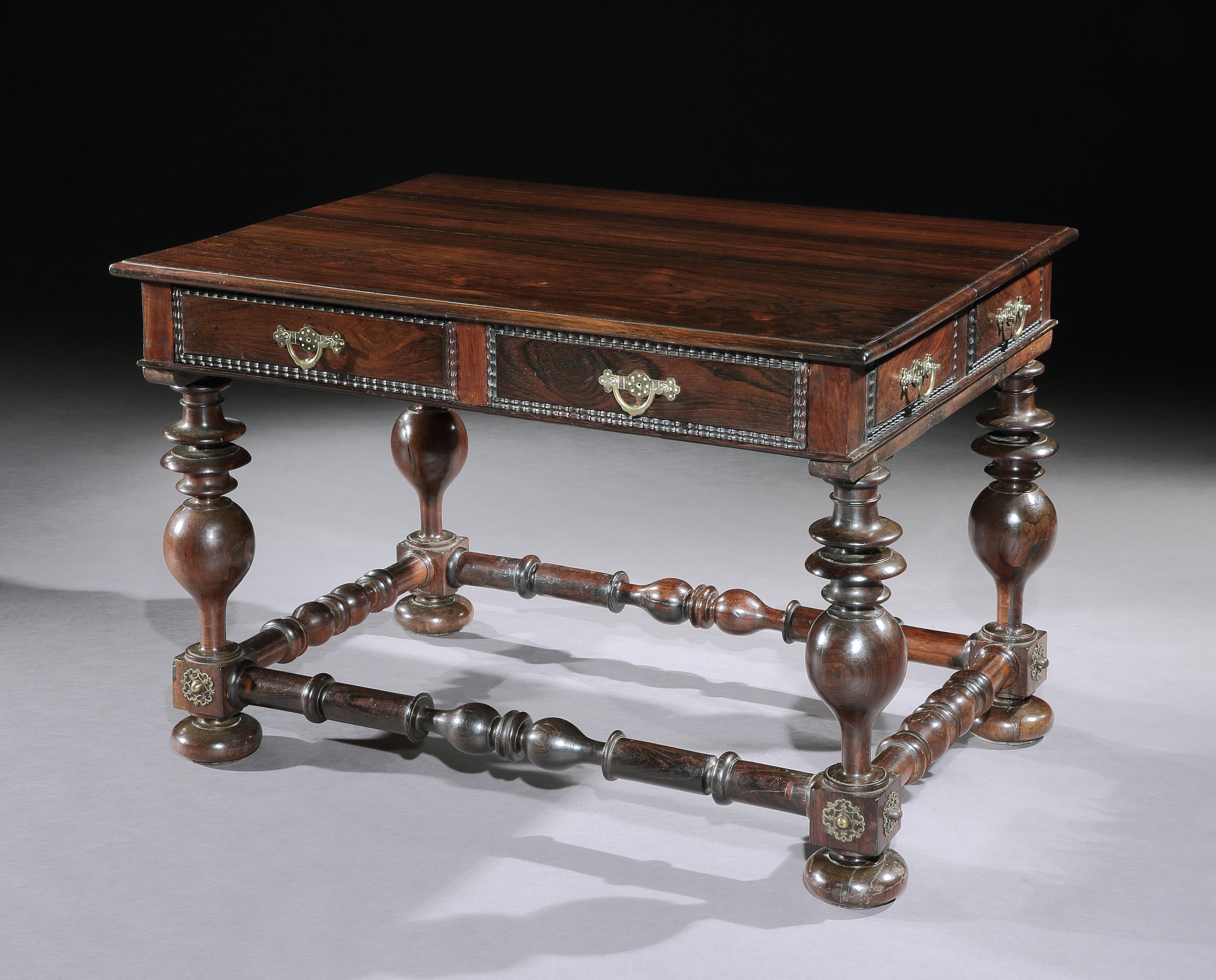 This handsome table is unusual as it has more Dutch influenced features than traditional Portuguese tables of the period. The use of ripple moldings around the friezes and drawers is a typical Dutch inspired feature used in Portuguese cabinet