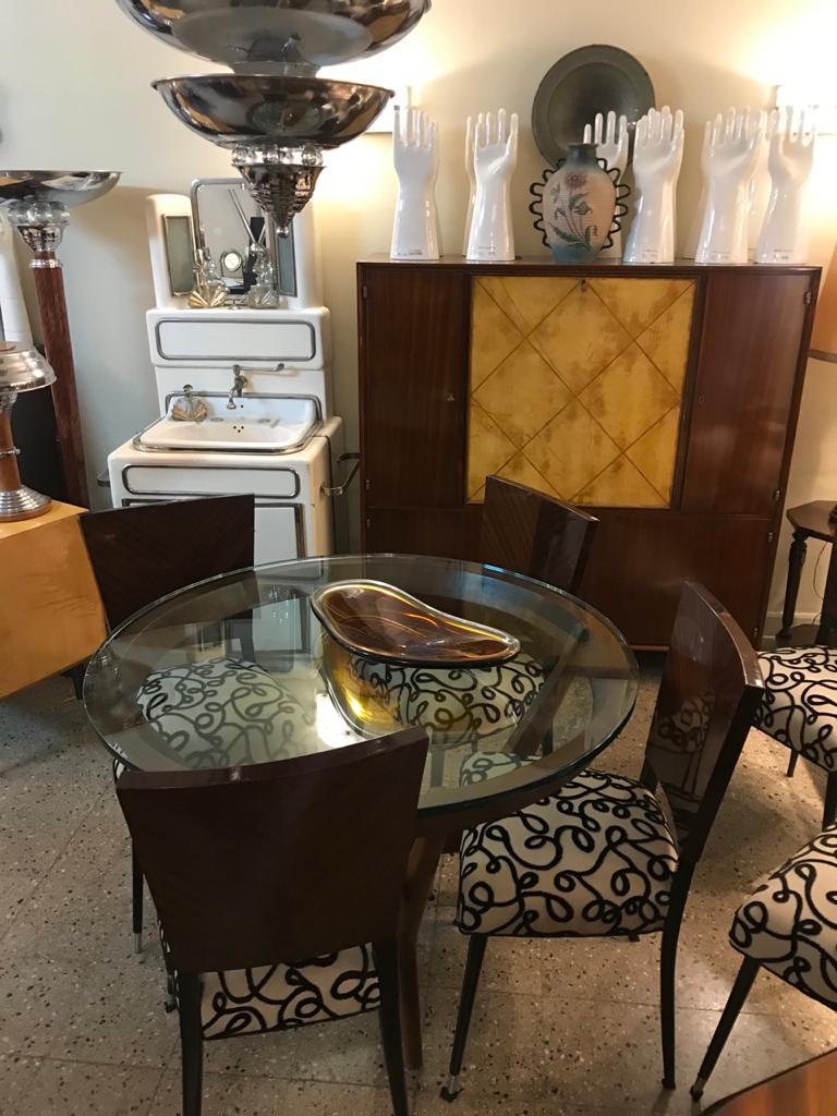 Table

Year: 1950
Country: French
Wood 
It is an elegant and sophisticated dining table.
You want to live in the golden years, this is the dining table that your project needs.
We have specialized in the sale of Art Deco and Art Nouveau and Vintage