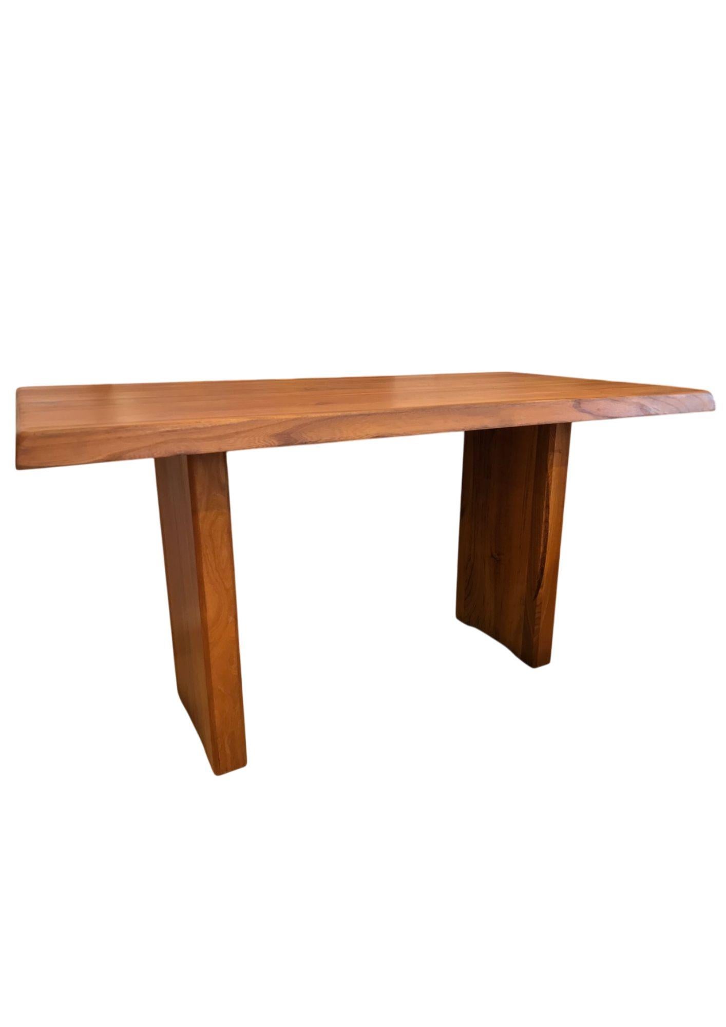 Solid elm dining table by French designer Pierre Chapo