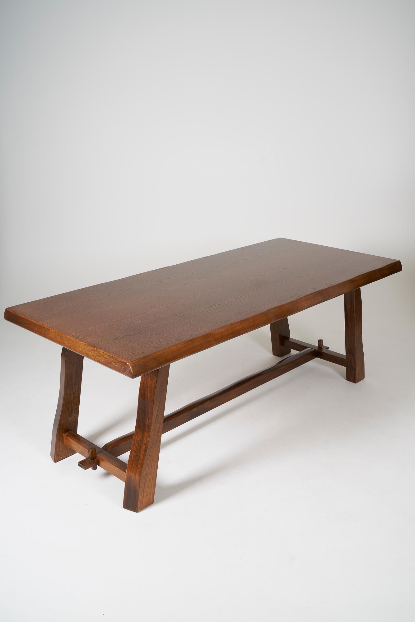 Beautiful solid elm dining table by Olavi Hanninen, Finland 1960s. In excellent condition with a very nice patina.