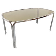 Table à manger rectangulaire incurvée vintage en verre fumé et métal chromé