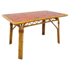 Table à manger vintage Audoux Minet en rotin et céramique de Vallauris