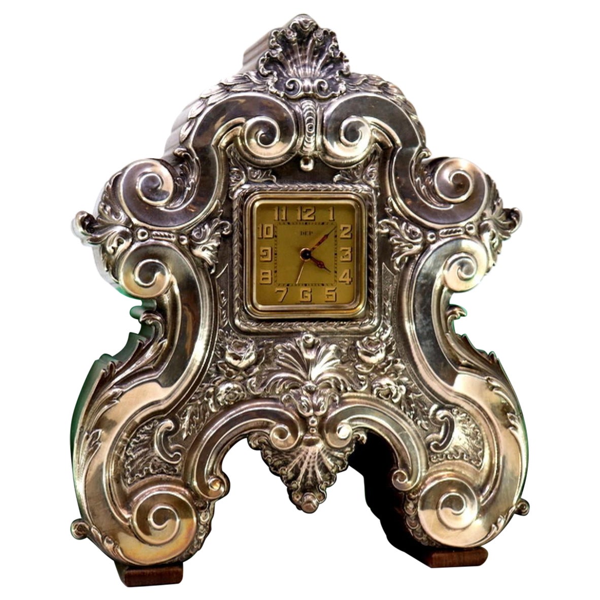 Table alarm clock in rosewood and embossed silver applications