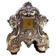 Table alarm clock in rosewood and embossed silver applications