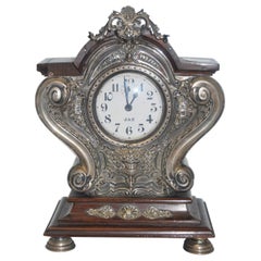 Table alarm clock in rosewood with silver applications