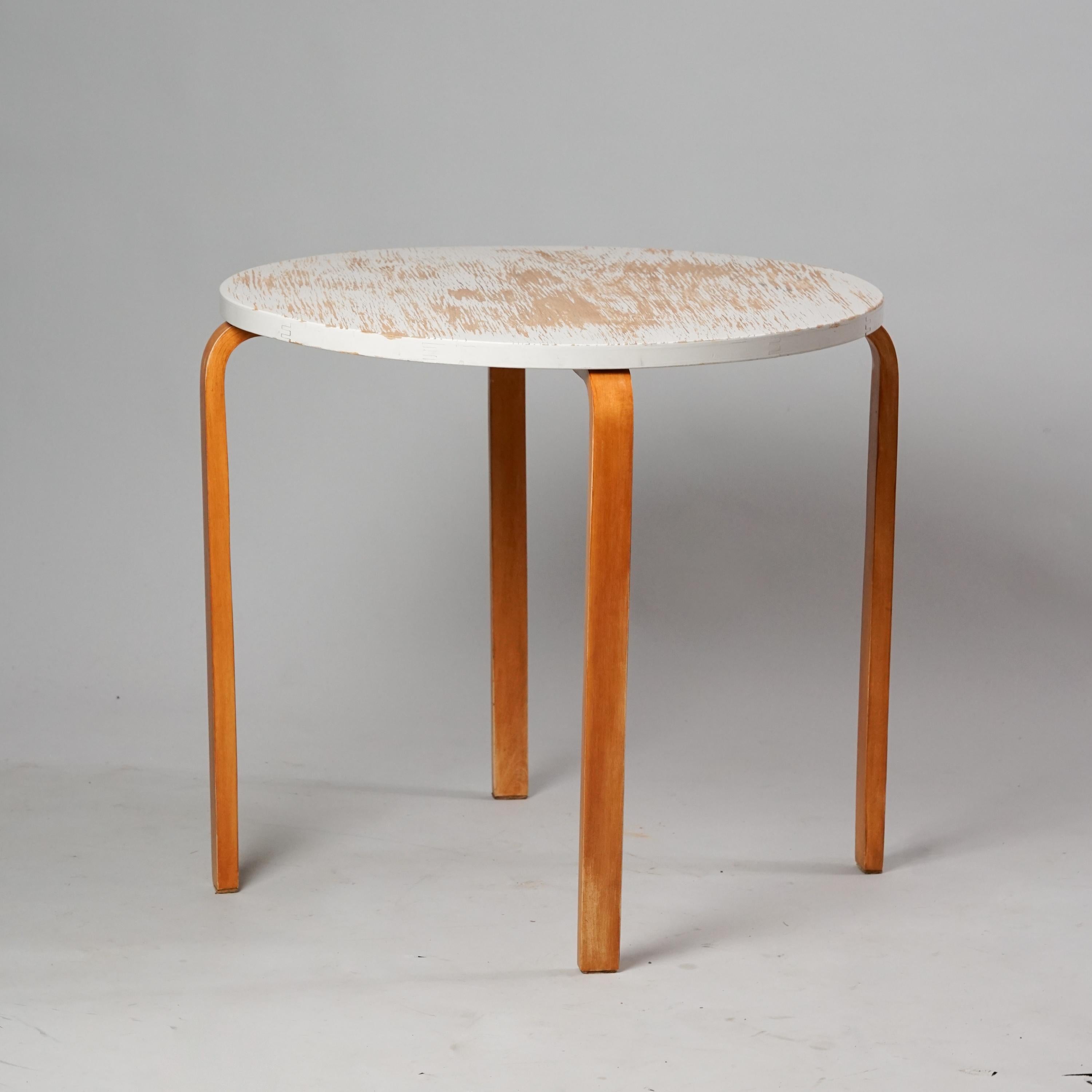 Table, designed by Alvar Aalto, manufactured by Oy Huonekalu- ja Rakennustyötehdas Ab, 1930s. Birch with original painted table top. Good vintage condition, rich patina consistent with age and use. 

Alvar Aalto (1898-1976) is probably the most